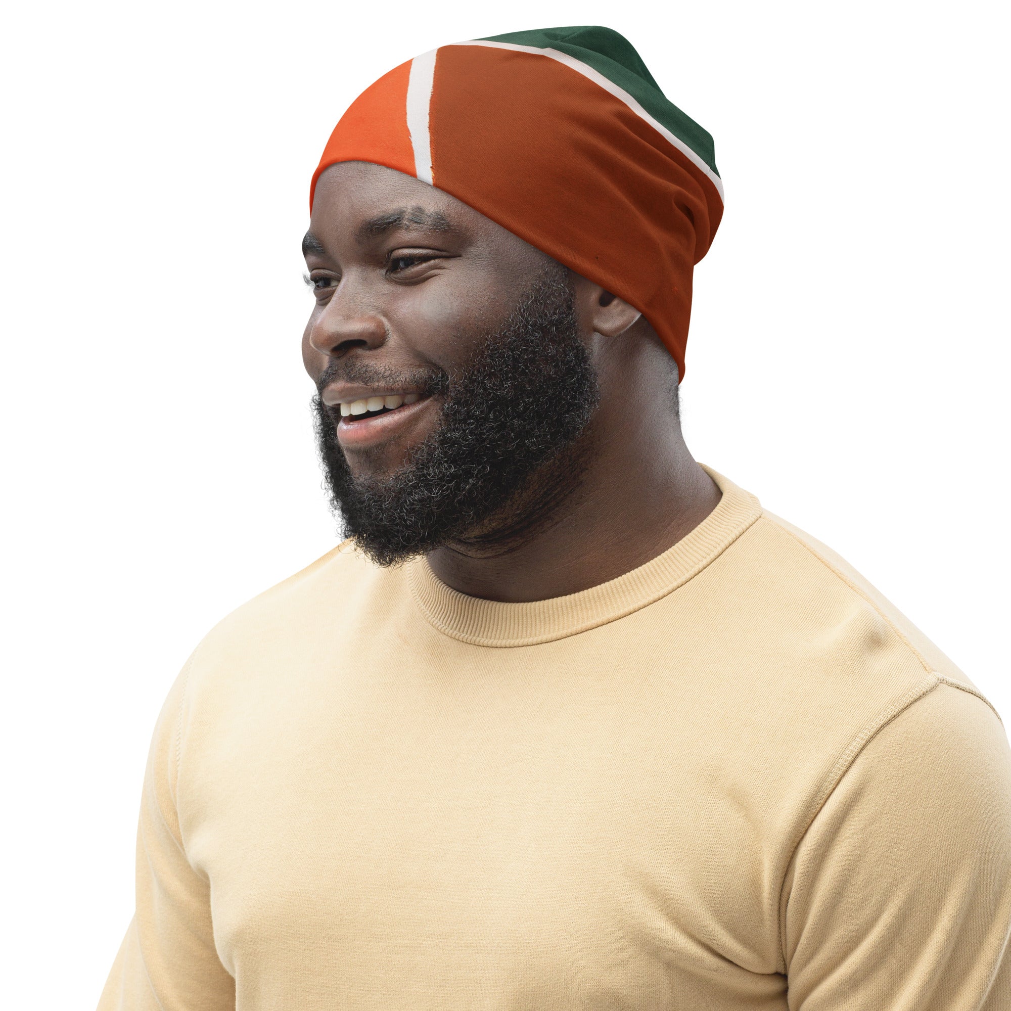 Double-layered beanie hat featuring an orange and green boho pattern, perfect for stylish warmth in any season.