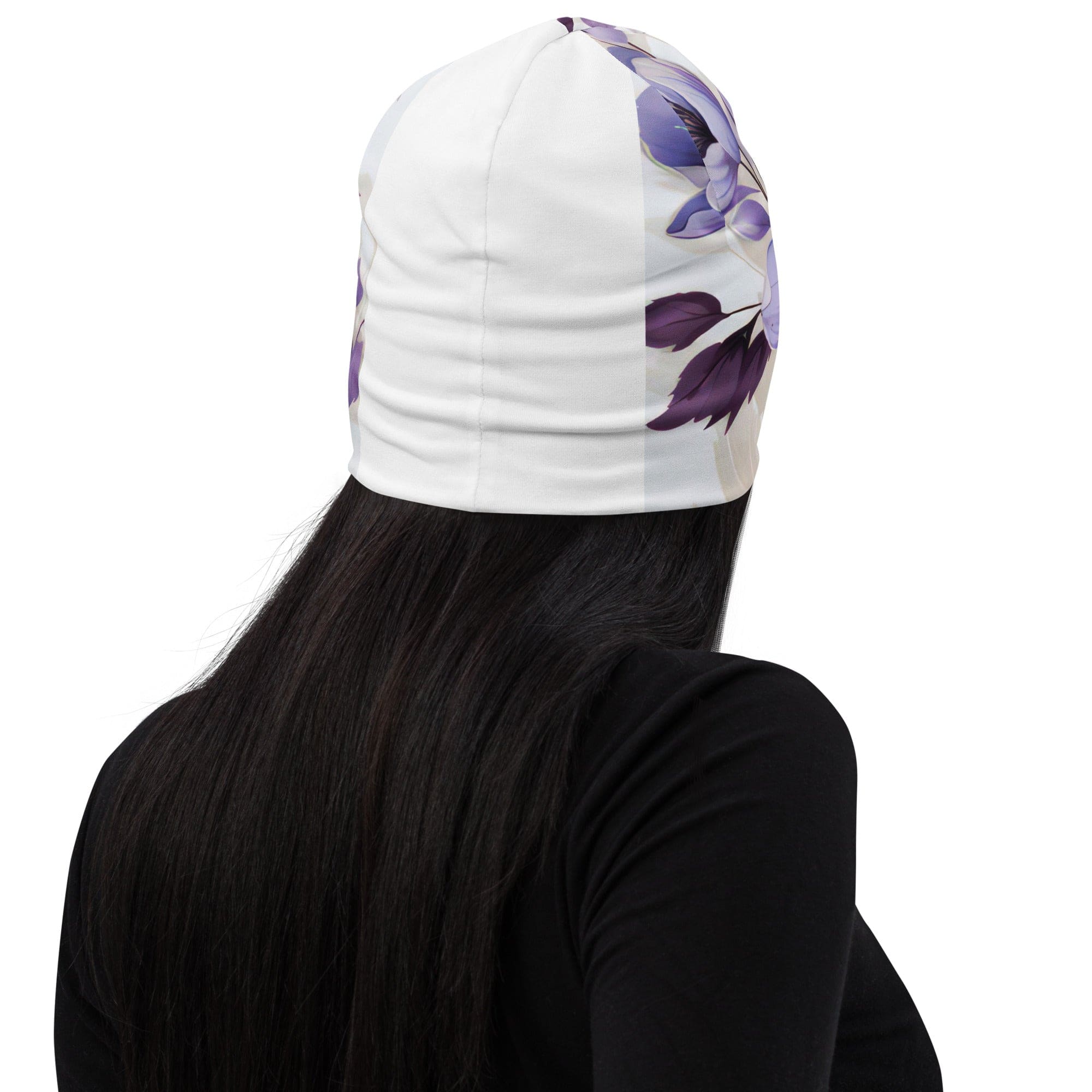 Double-layered beanie hat featuring a vibrant purple botanical blooms design, perfect for winter and spring wear.