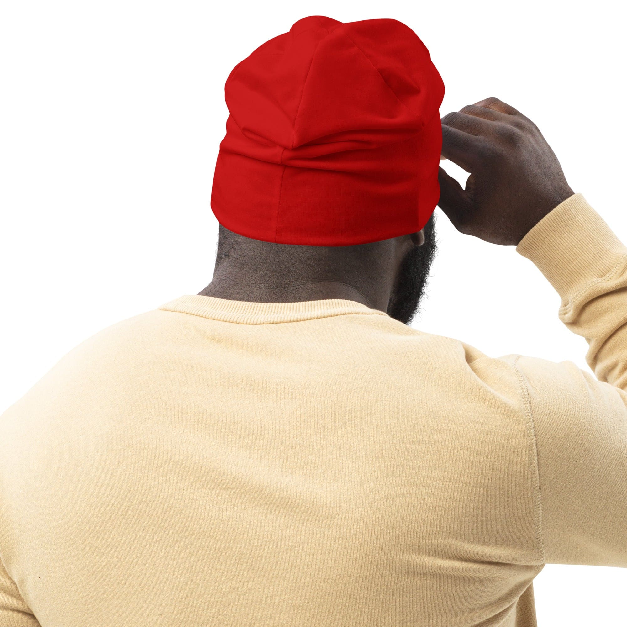 A vibrant red double-layered beanie hat, showcasing its soft fabric and stylish design, perfect for winter and fall wear.