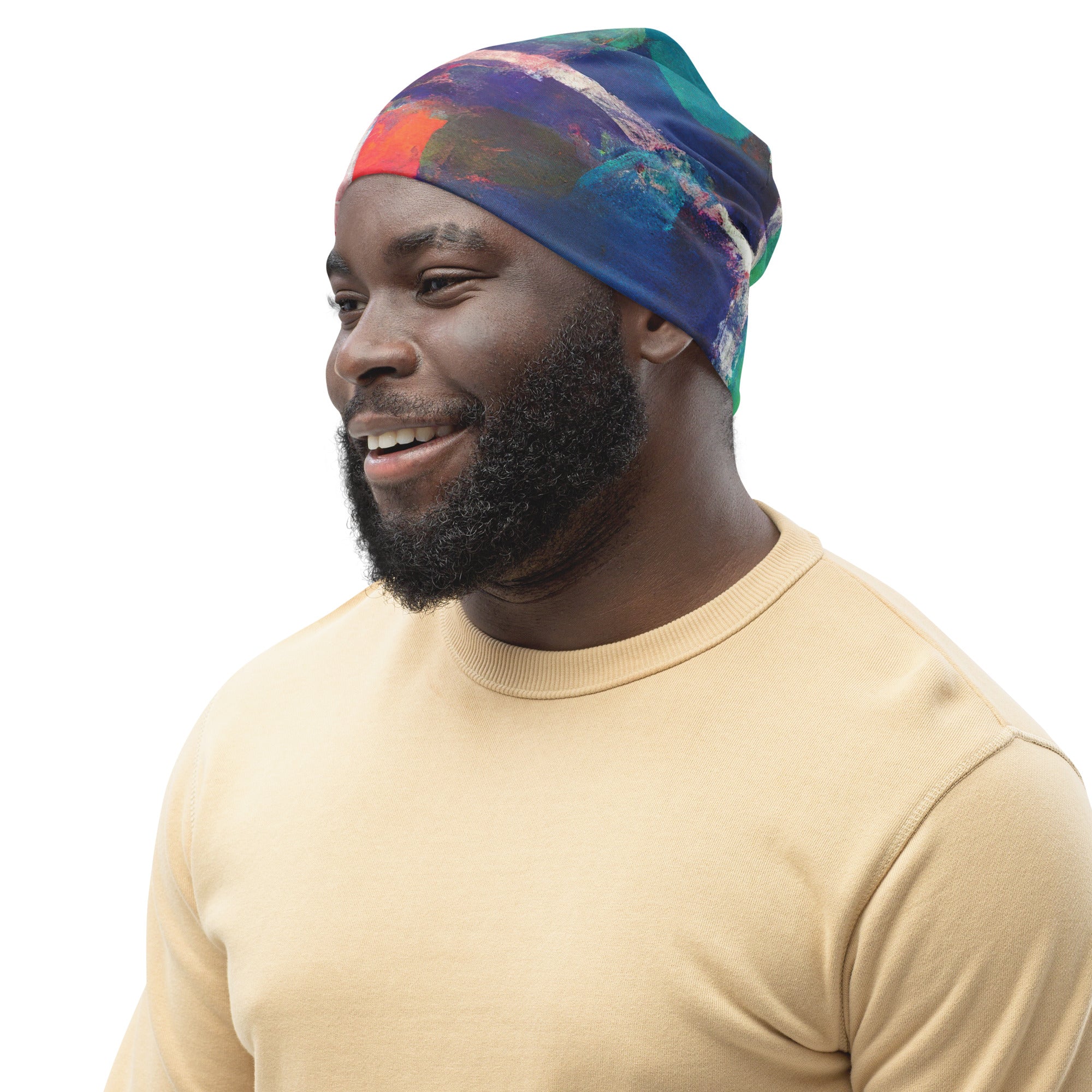 Double-layered beanie hat featuring a vibrant red and blue abstract print, perfect for winter and spring wear.