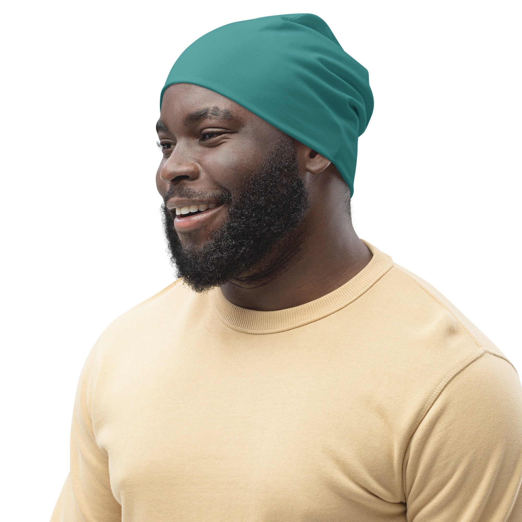 Double-layered teal green beanie hat, soft and stylish, perfect for winter and spring wear.