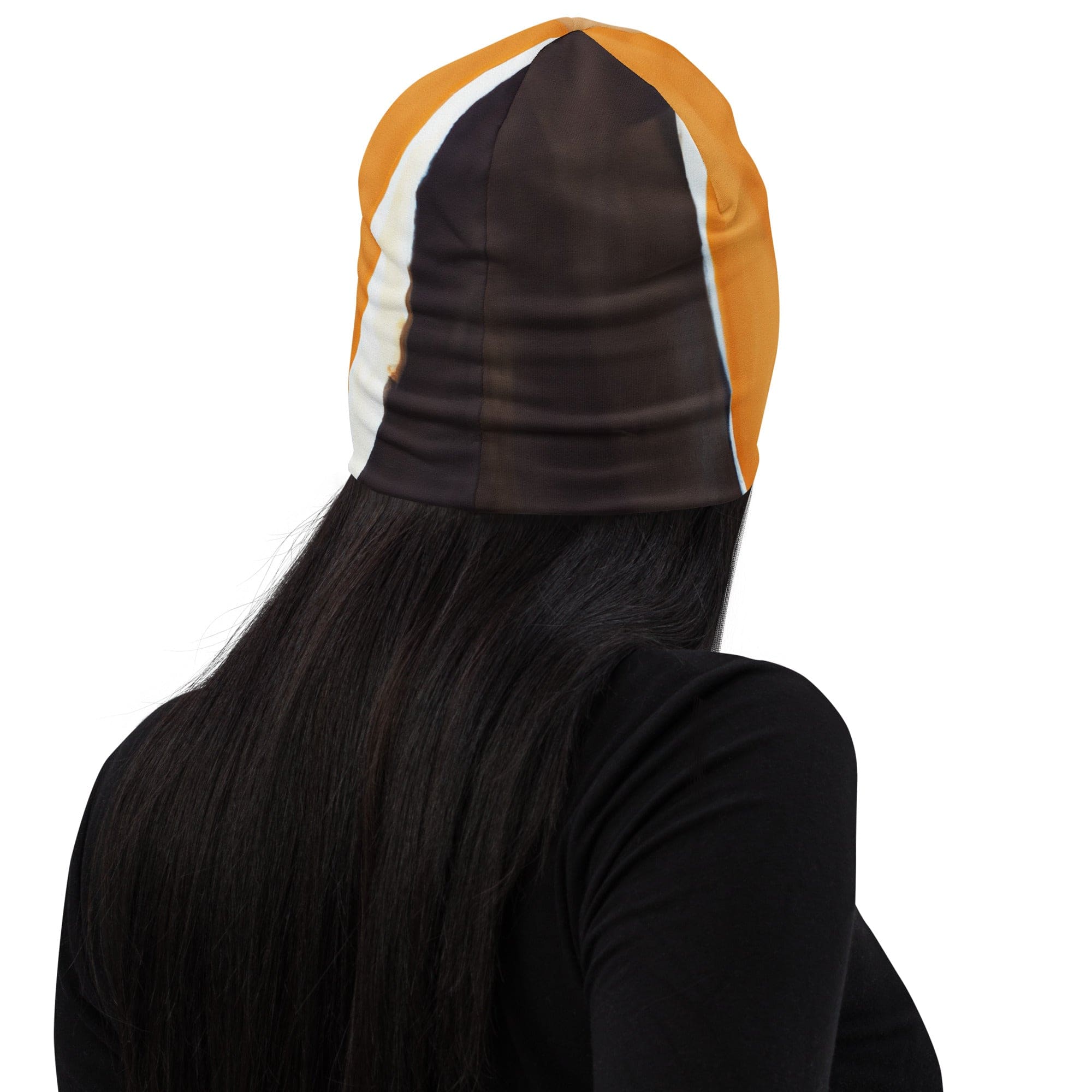 Double-layered beanie hat featuring a yellow and brown abstract pattern, perfect for winter and stylish outfits.