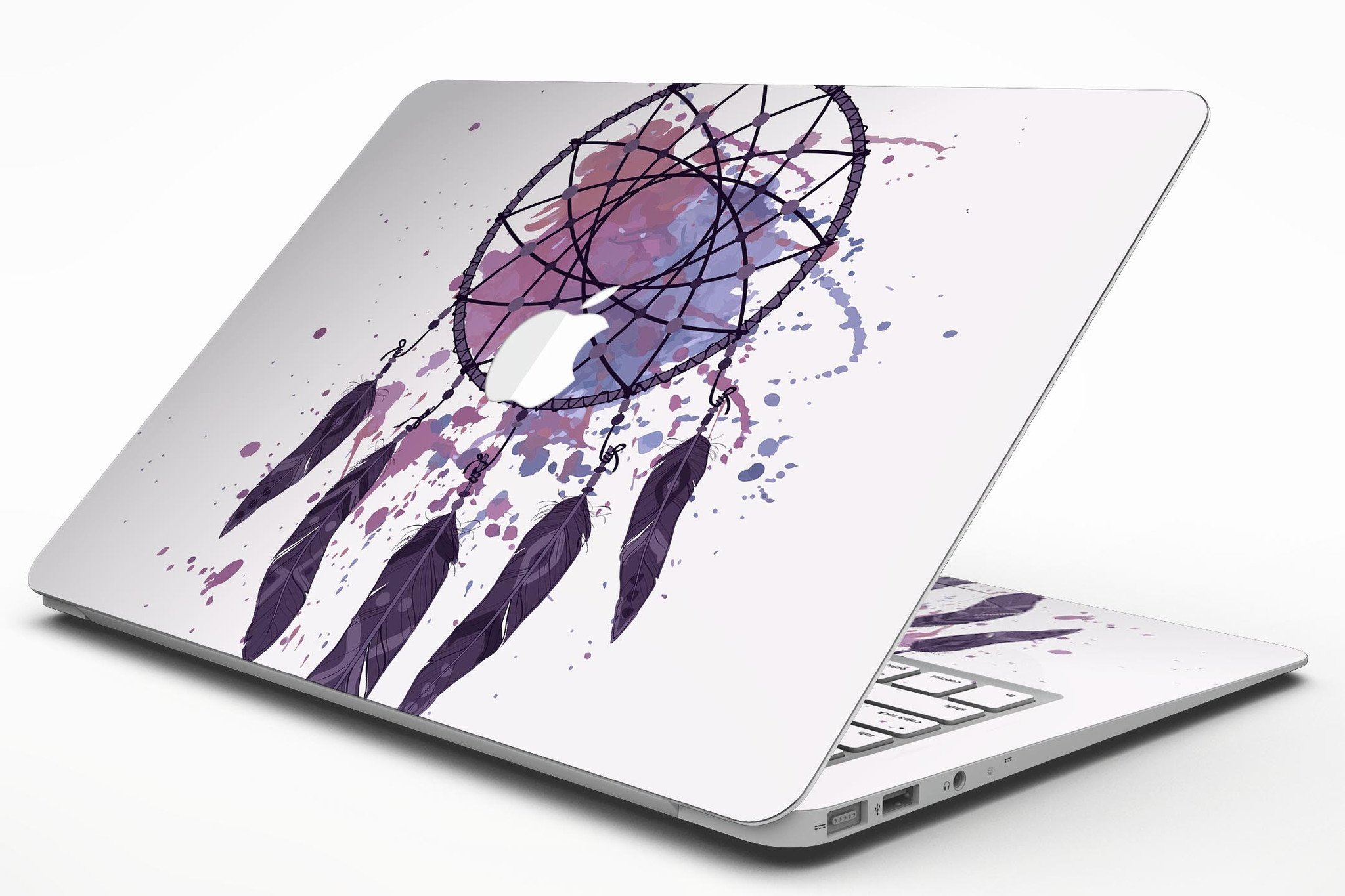 Dreamcatcher Splatter MacBook Air Skin Kit showcasing vibrant splatter design on a sleek MacBook Air.