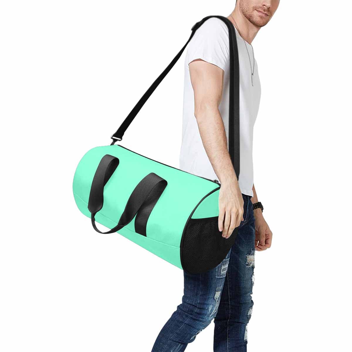 Aquamarine Green Duffel Bag designed for travel and outdoor activities, featuring waterproof fabric and spacious compartments.