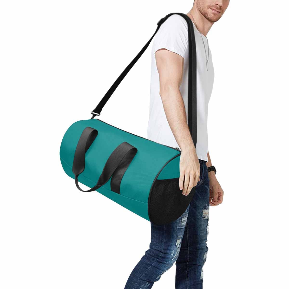 Dark Teal Green Duffel Bag designed for travel and outdoor activities, featuring waterproof fabric and spacious compartments.