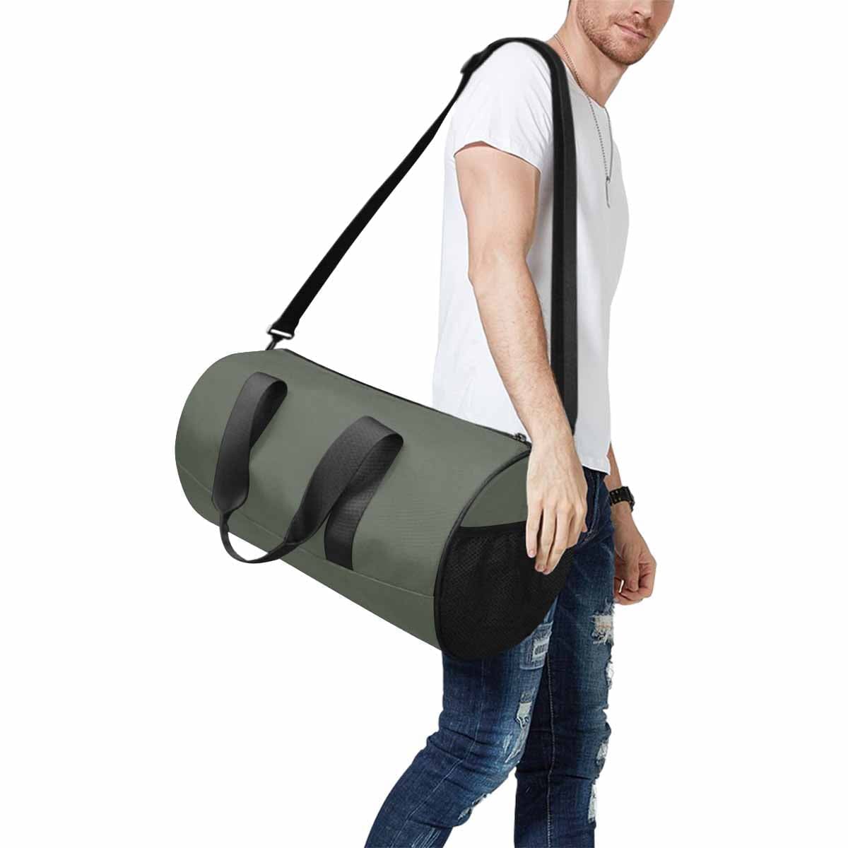 Ebony Black Duffel Bag with spacious compartments and adjustable strap, ideal for travel and outdoor activities.