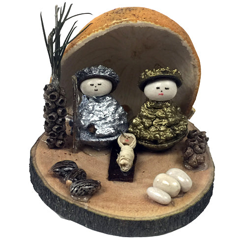 Ecualyptus and Orange Peel Nativity featuring Mary, Joseph, and Baby Jesus, handmade with natural materials.