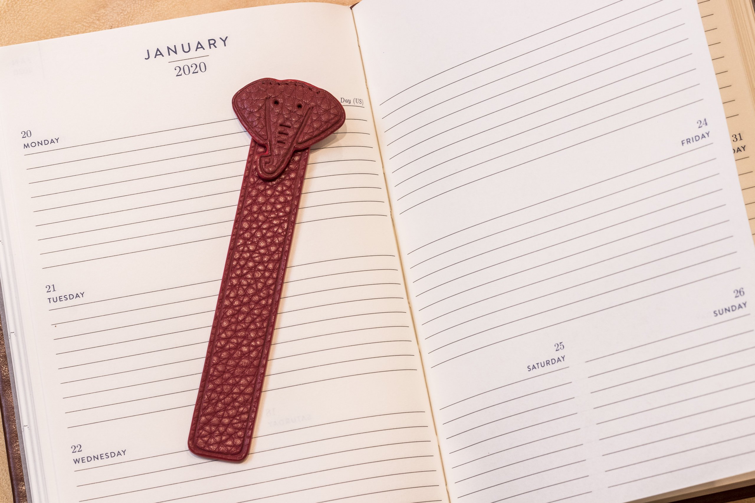 A stylish Elephant Bookmark made from genuine pebble leather featuring a unique elephant head design.