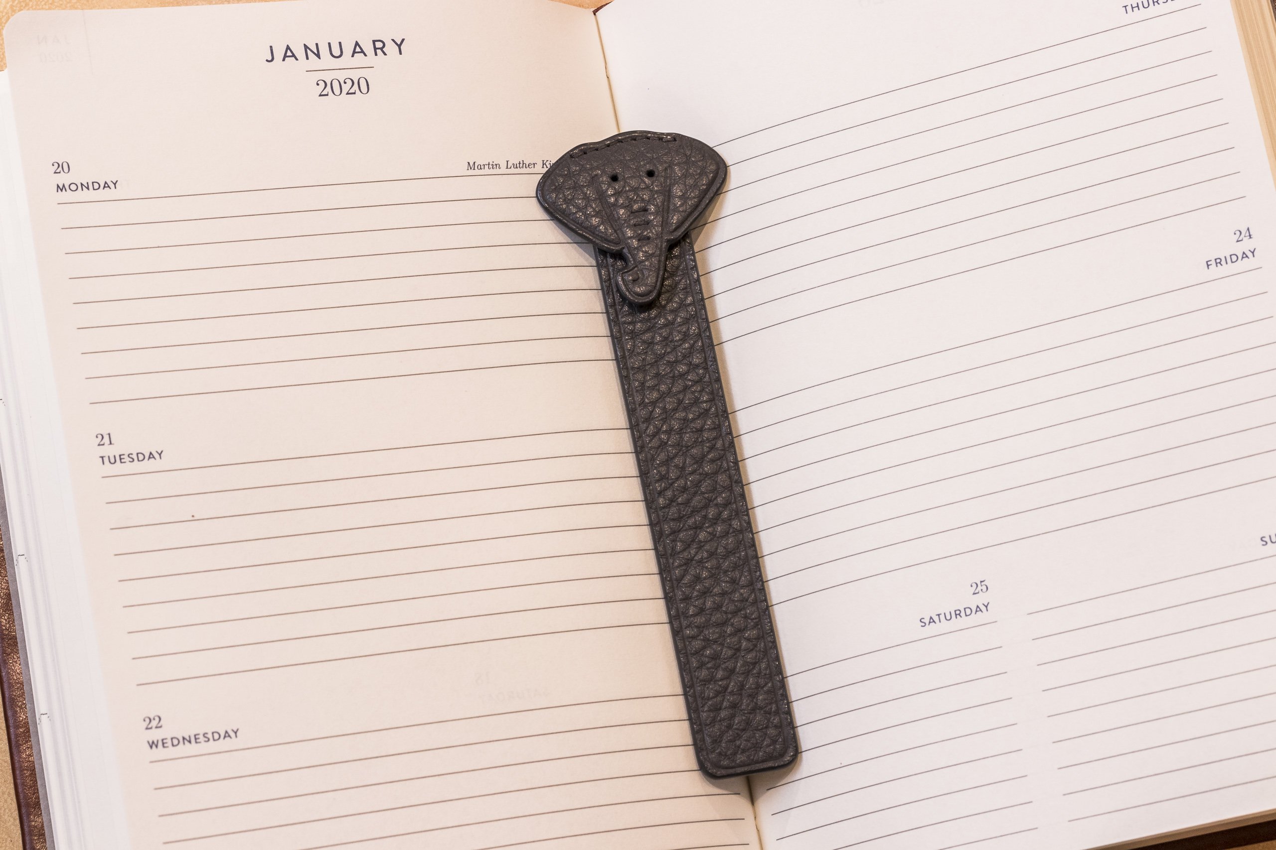 A stylish Elephant Bookmark made from genuine pebble leather featuring a unique elephant head design.