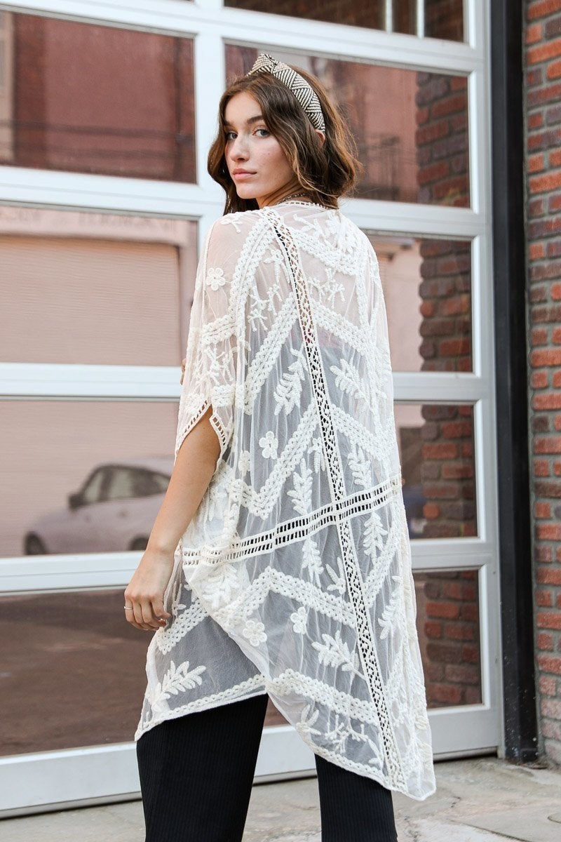 A lightweight embroidered mesh leaf kimono in various colors, perfect for spring and summer outfits, featuring intricate leaf patterns.