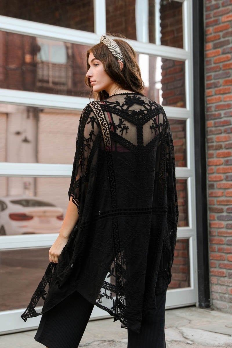 A lightweight embroidered mesh leaf kimono in various colors, perfect for spring and summer outfits, featuring intricate leaf patterns.