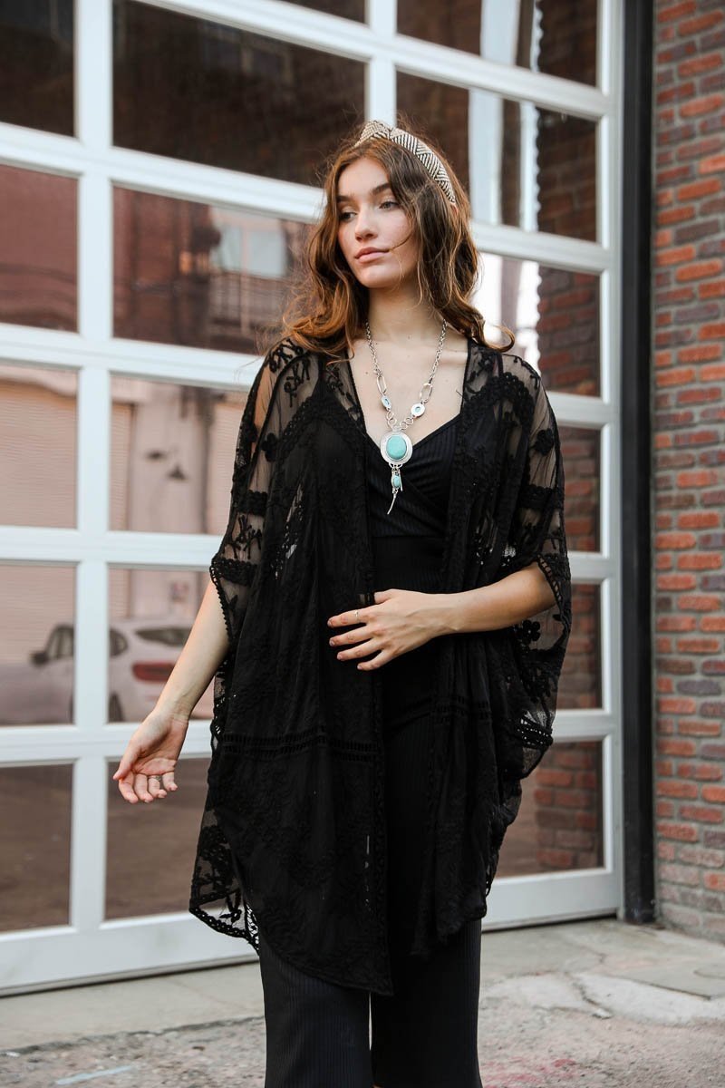 A lightweight embroidered mesh leaf kimono in various colors, perfect for spring and summer outfits, featuring intricate leaf patterns.