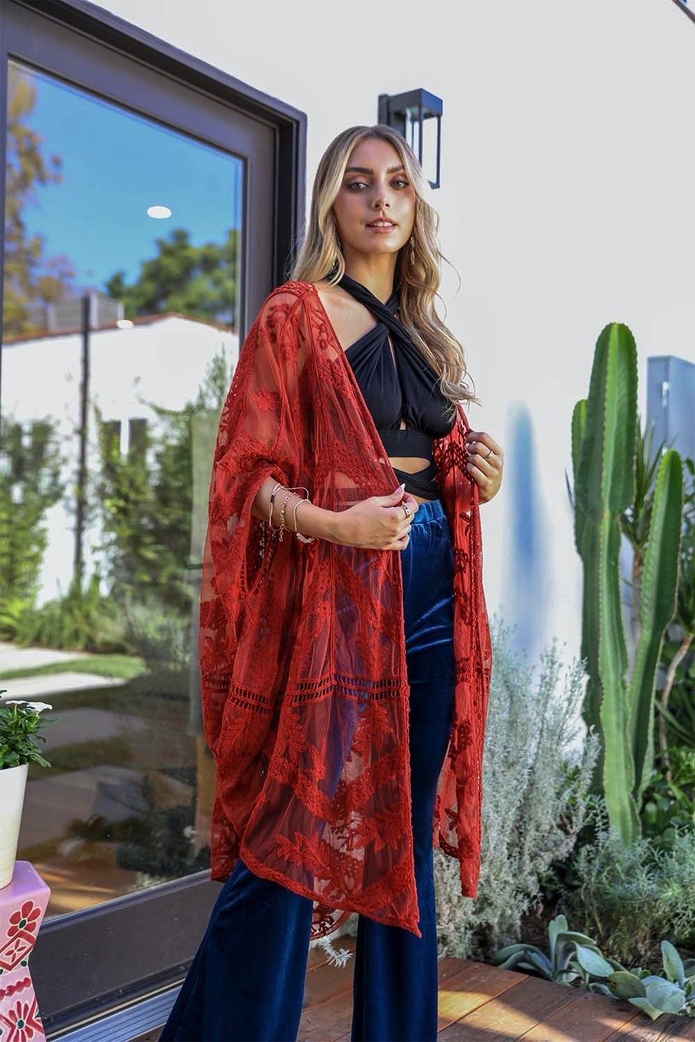 A lightweight embroidered mesh leaf kimono in various colors, perfect for spring and summer outfits, featuring intricate leaf patterns.