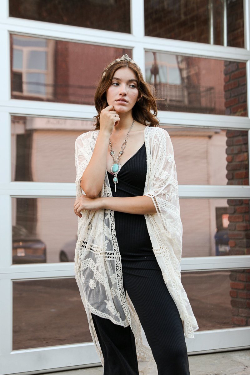 A lightweight embroidered mesh leaf kimono in various colors, perfect for spring and summer outfits, featuring intricate leaf patterns.