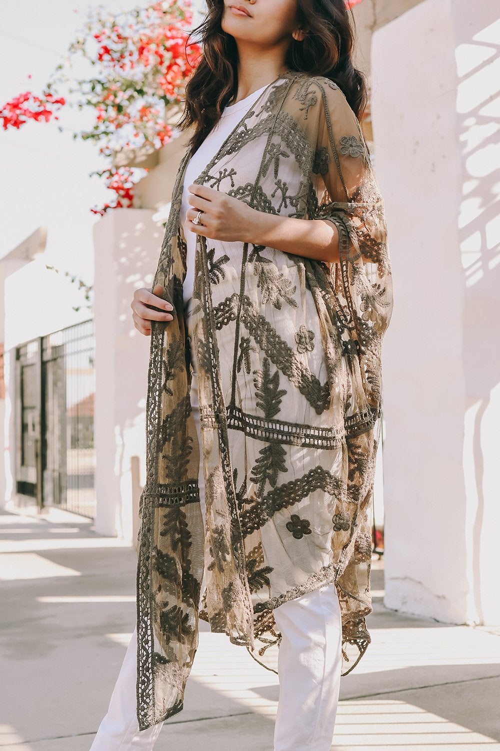 A lightweight embroidered mesh leaf kimono in various colors, perfect for spring and summer outfits, featuring intricate leaf patterns.