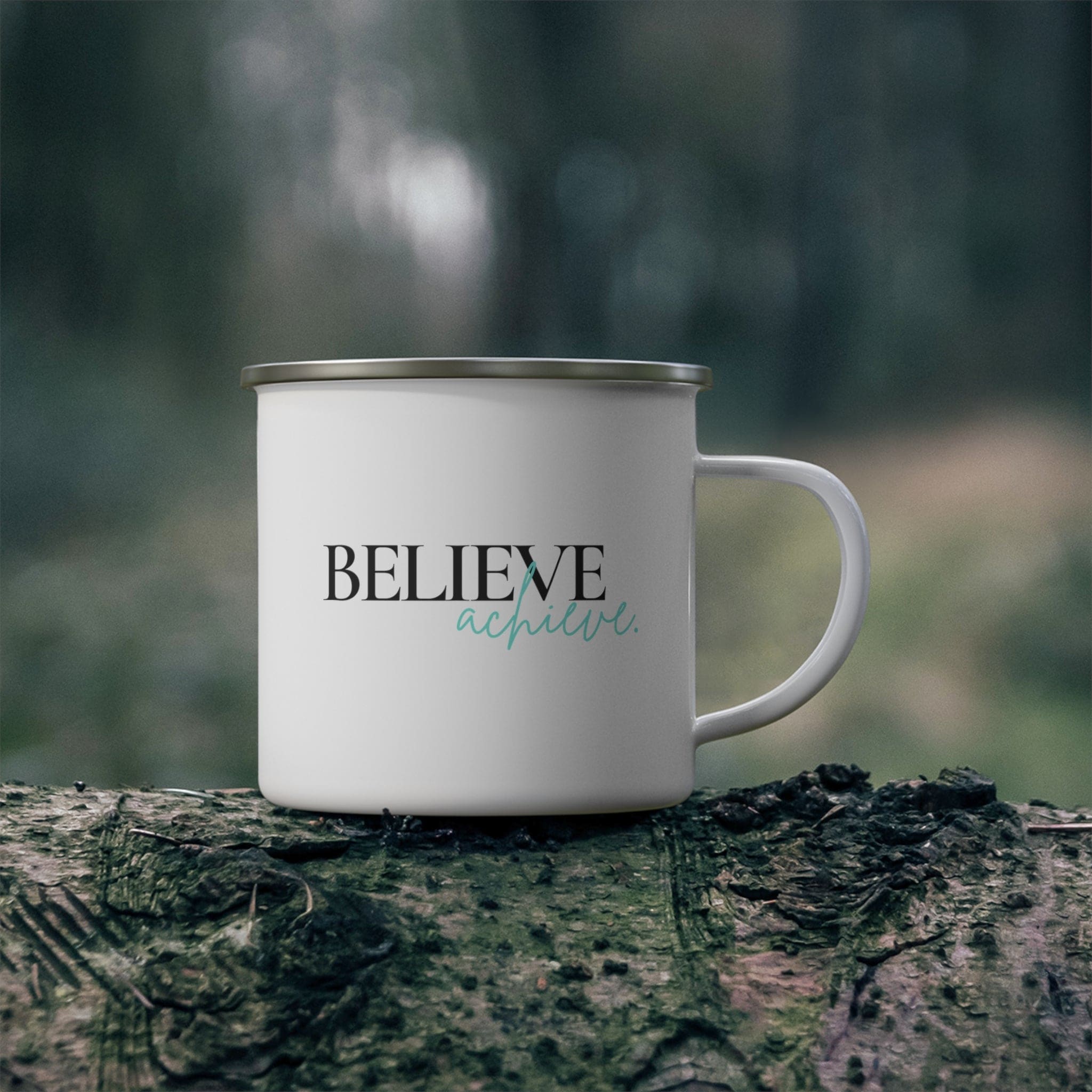 Durable enamel camping mug with 'Believe and Achieve' motivational design, perfect for coffee, tea, and cereal.