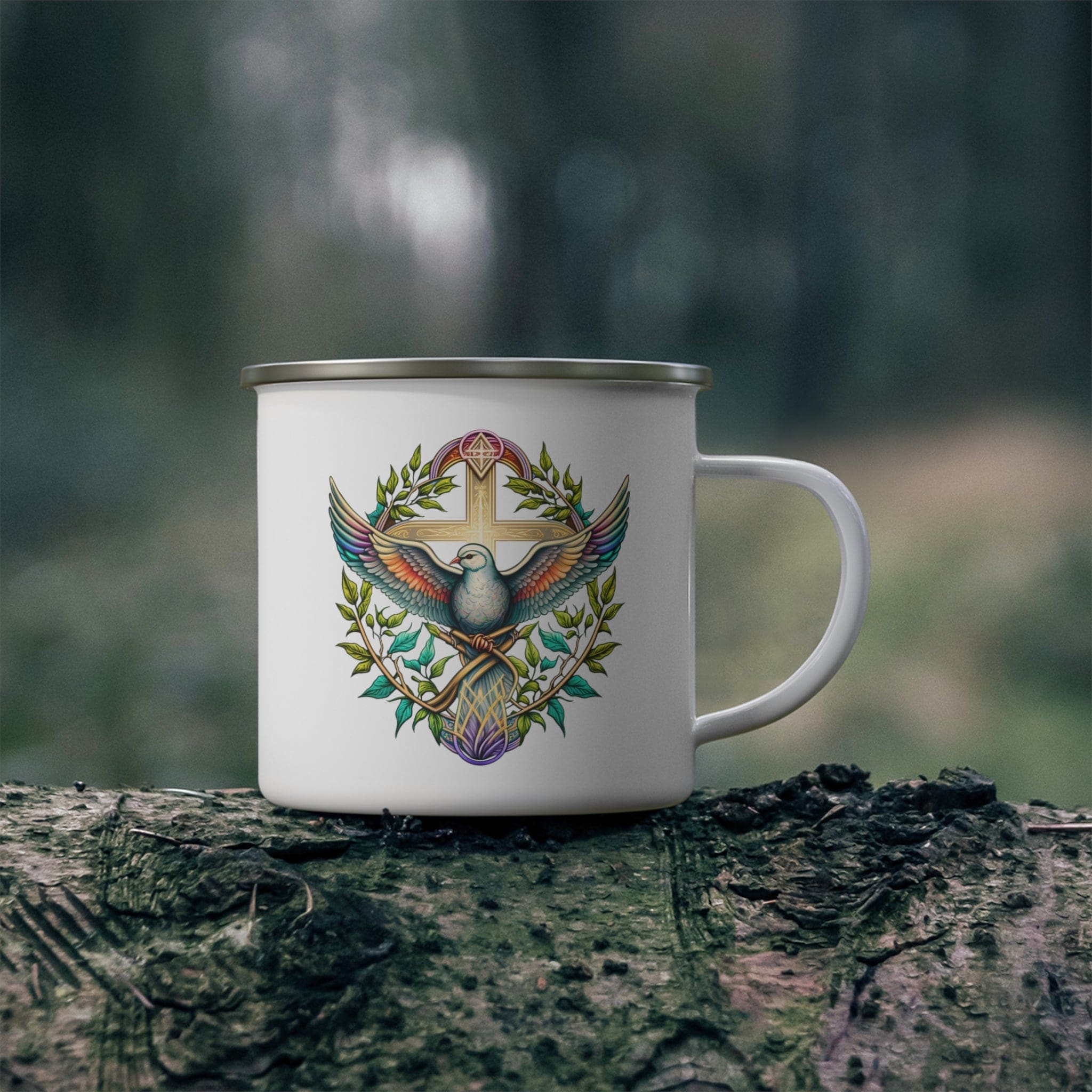 Blue green enamel camping mug featuring a multicolor dove floral illustration, perfect for outdoor activities.