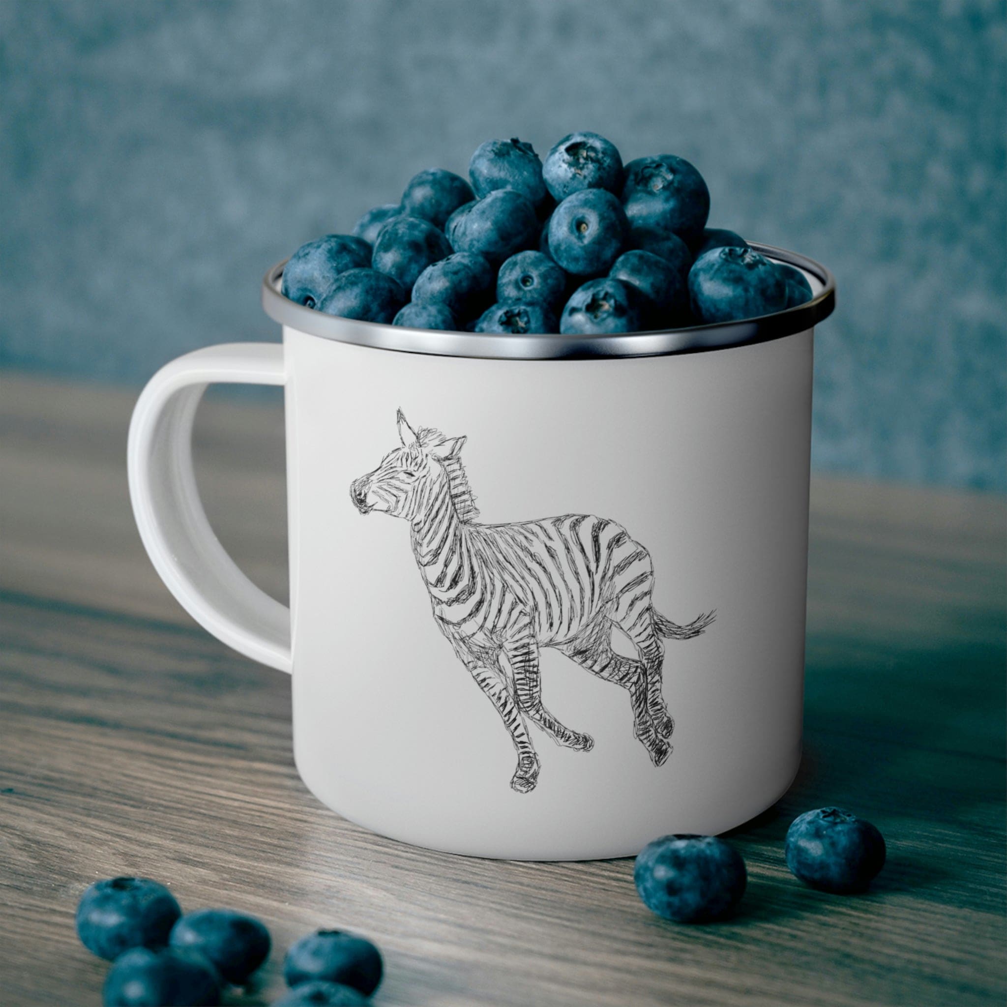 Enamel camping mug featuring a galloping zebra line art design, perfect for outdoor adventures and stylish beverage enjoyment.