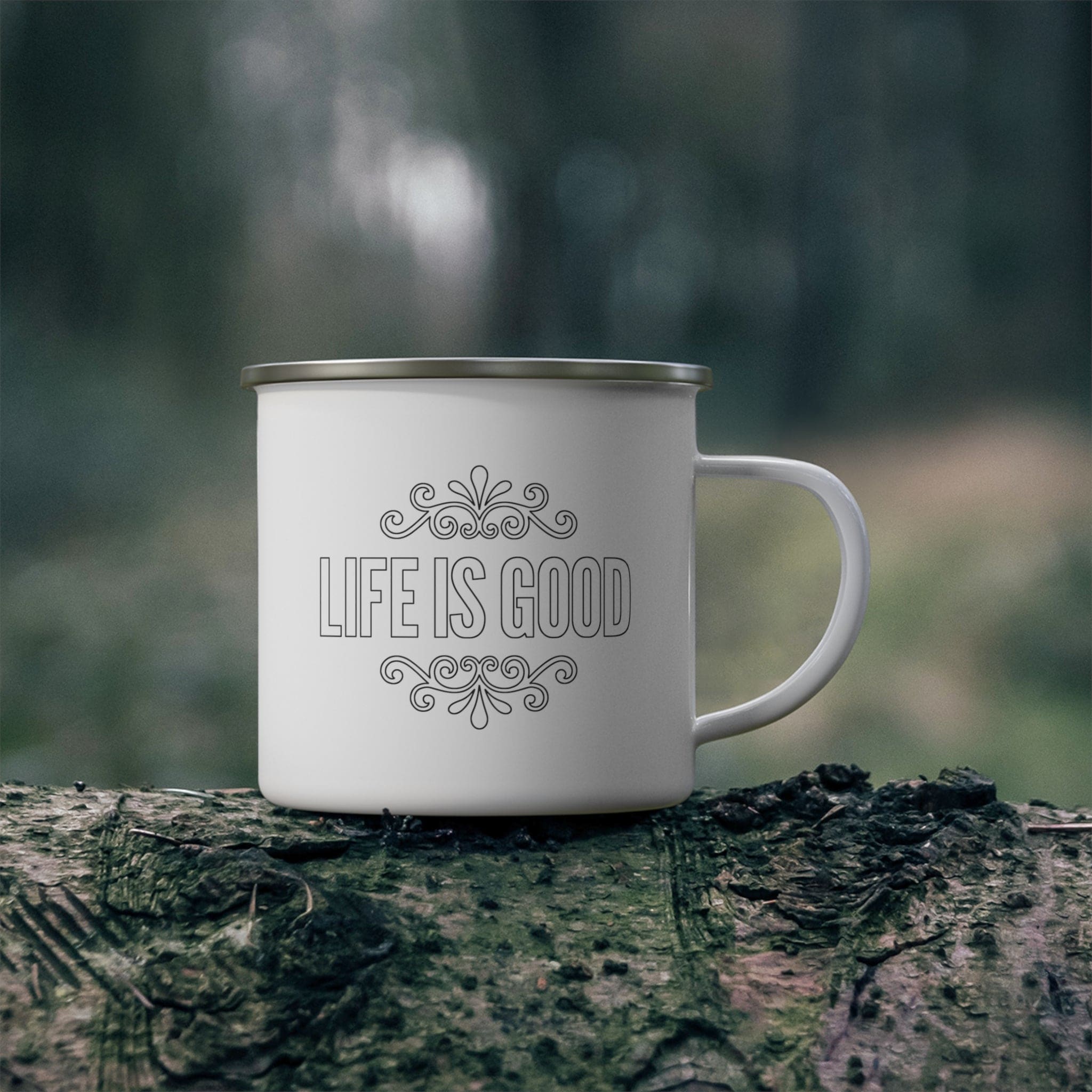 Durable enamel camping mug featuring a black outline graphic illustration with the phrase 'Life is Good'. Perfect for outdoor and indoor use.