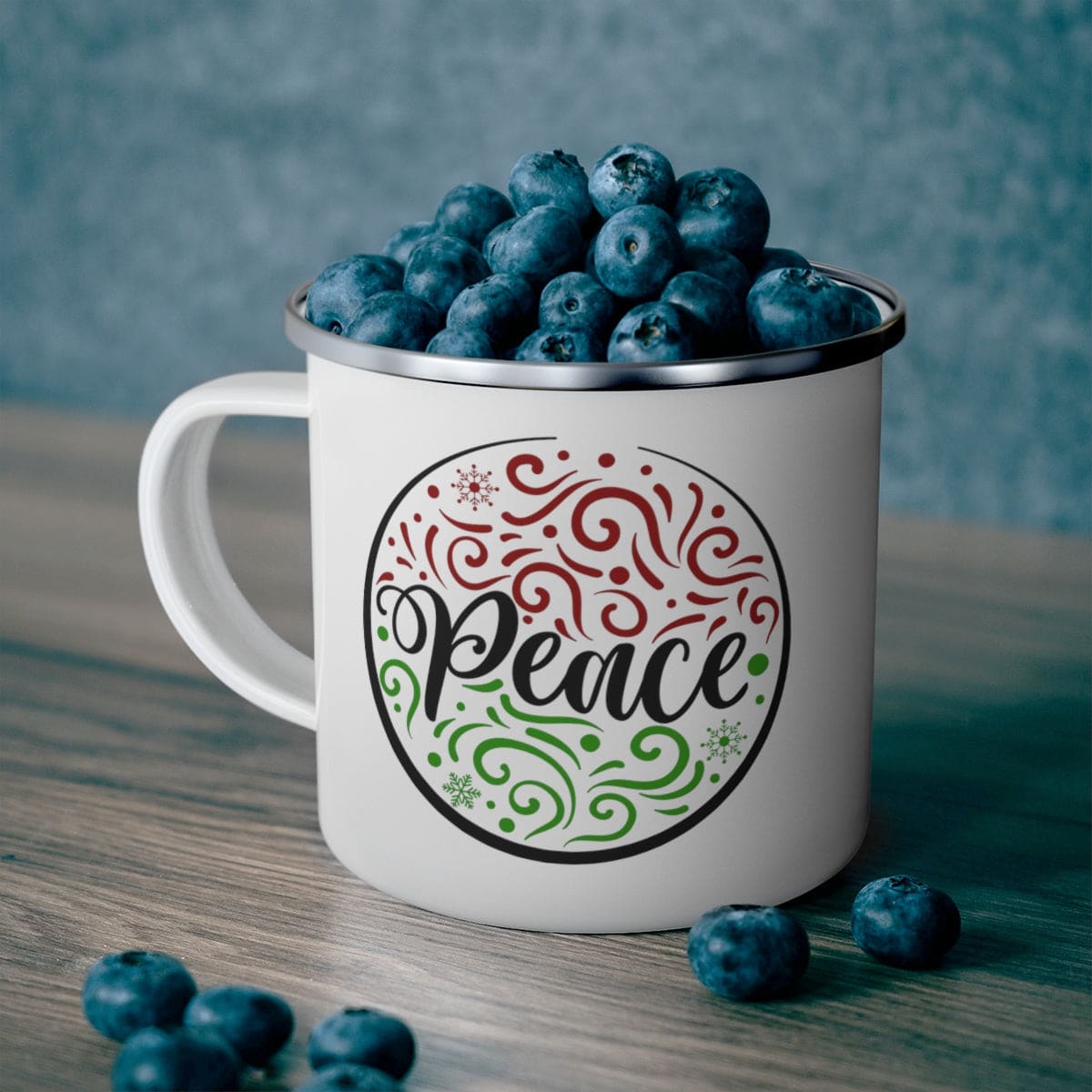 Durable enamel camping mug with Peace Holiday Print, perfect for beverages.