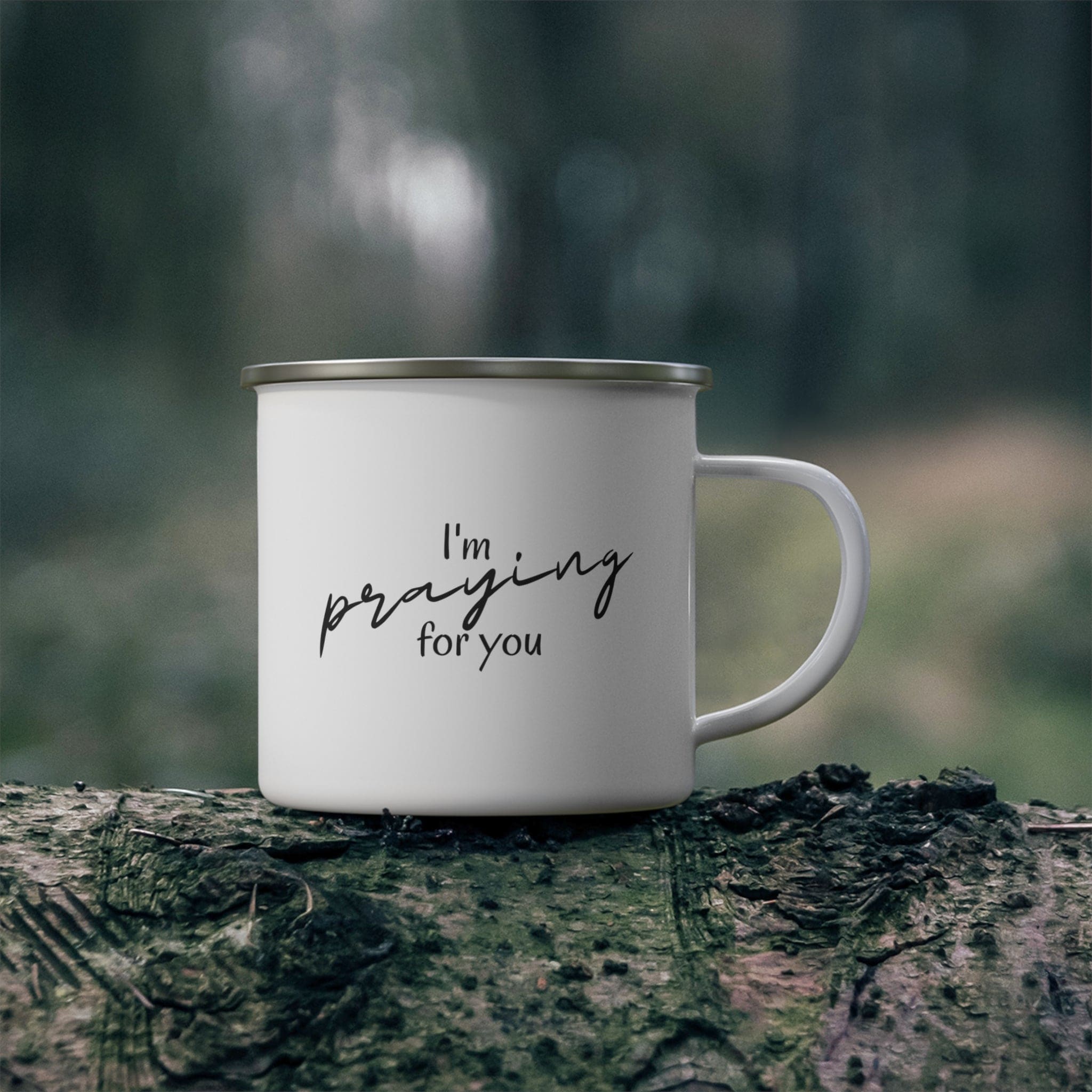 Durable enamel camping mug with a stylish design, perfect for outdoor and indoor use, featuring a comfortable C-handle.