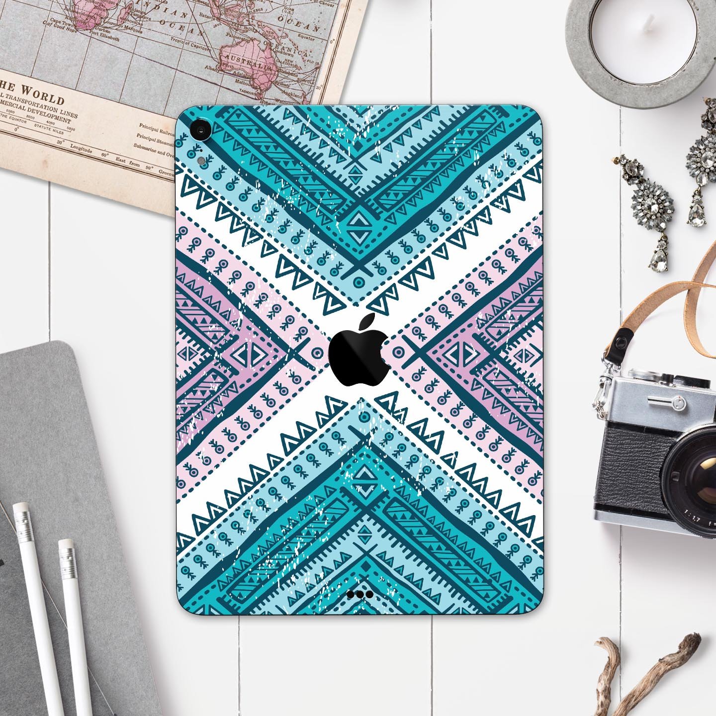 Ethnic Aztec Blue and Pink Point skin decal for Apple devices, showcasing vibrant colors and intricate patterns for stylish protection.