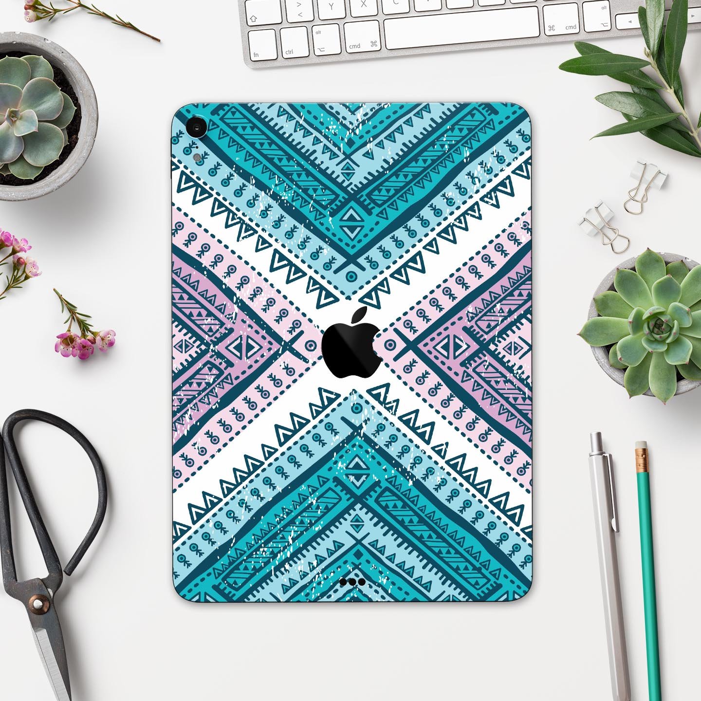 Ethnic Aztec Blue and Pink Point skin decal for Apple devices, showcasing vibrant colors and intricate patterns for stylish protection.