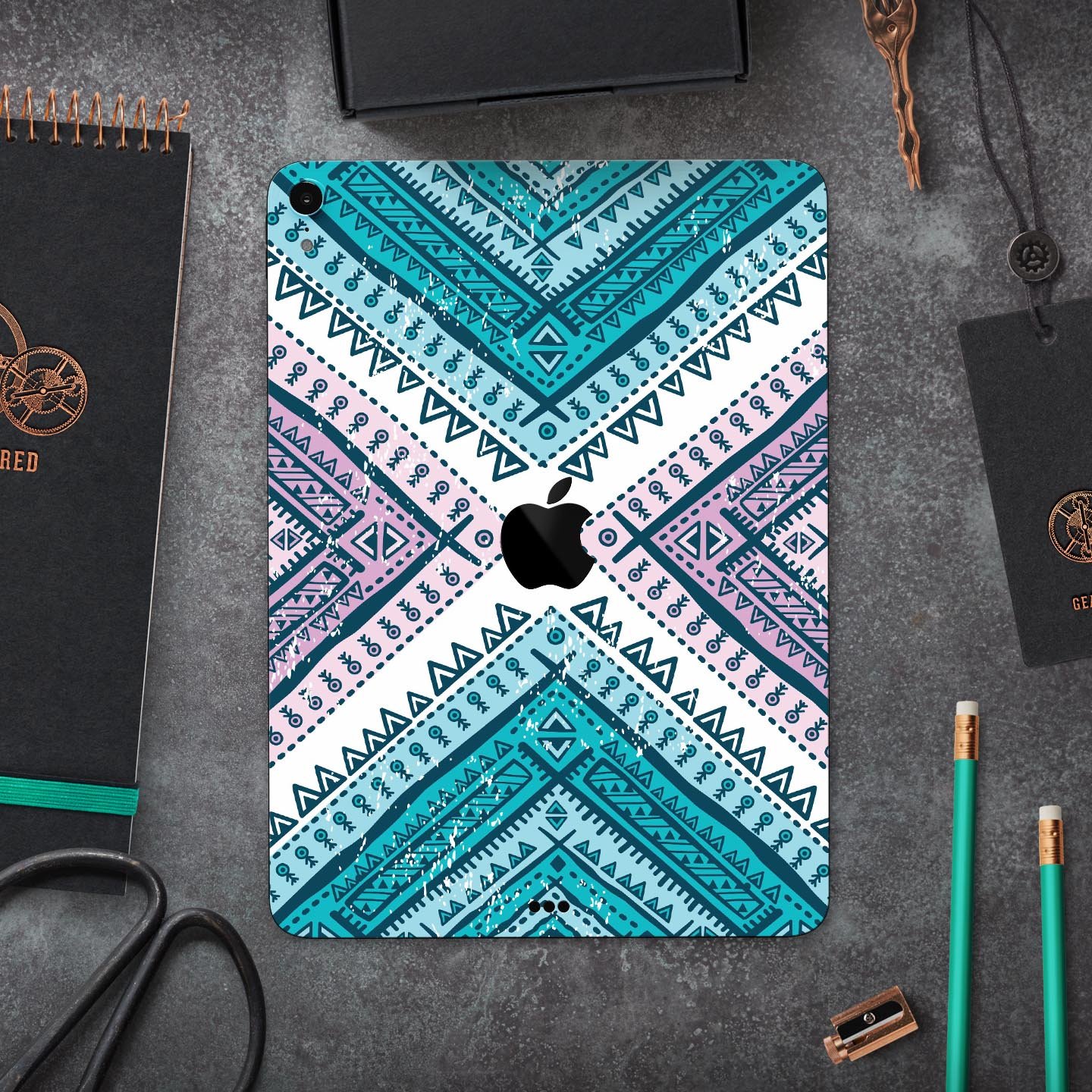 Ethnic Aztec Blue and Pink Point skin decal for Apple devices, showcasing vibrant colors and intricate patterns for stylish protection.