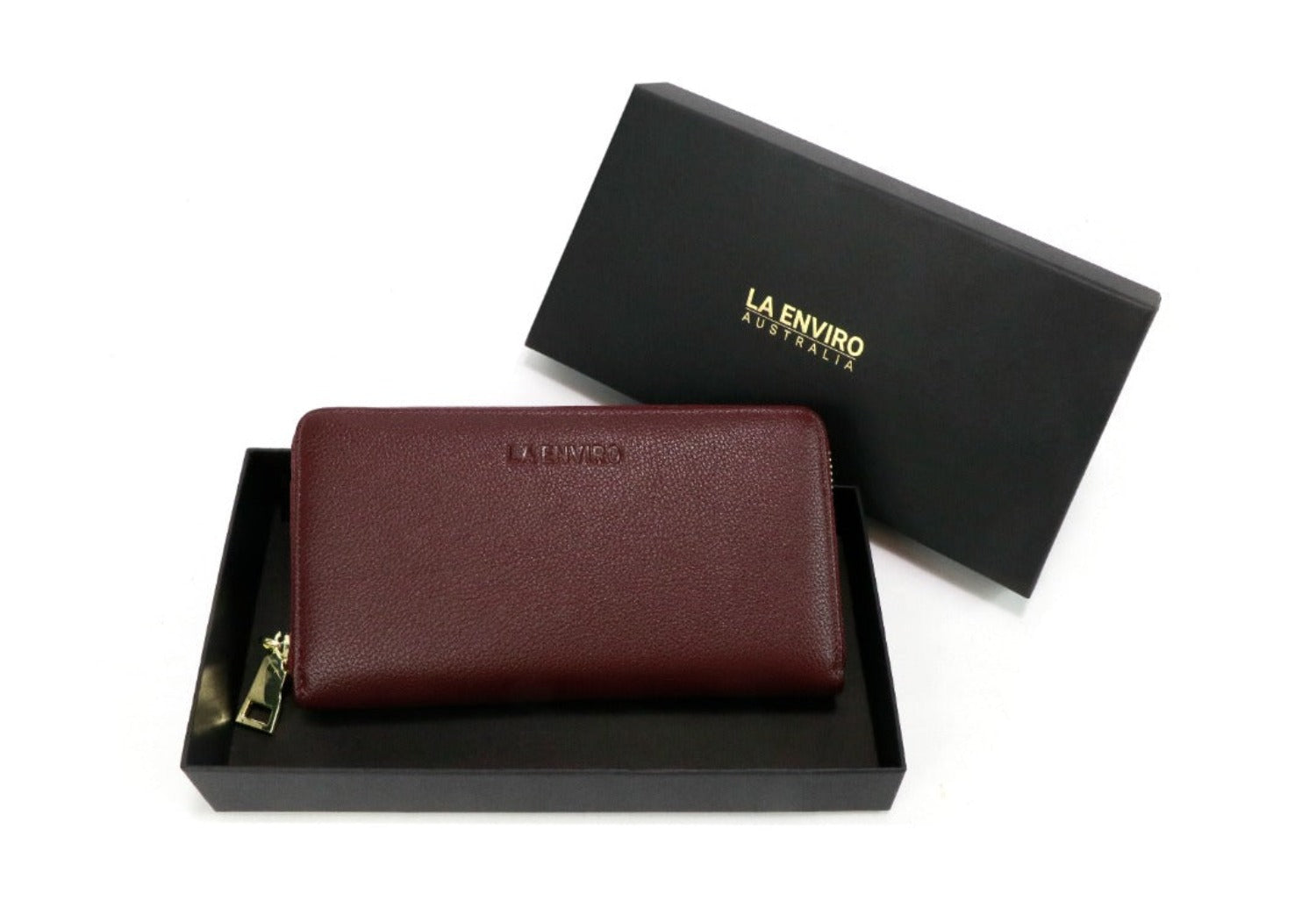 EVA Wallet in Wine color, featuring zip-around design, premium vegan leather, and golden metallic hardware.