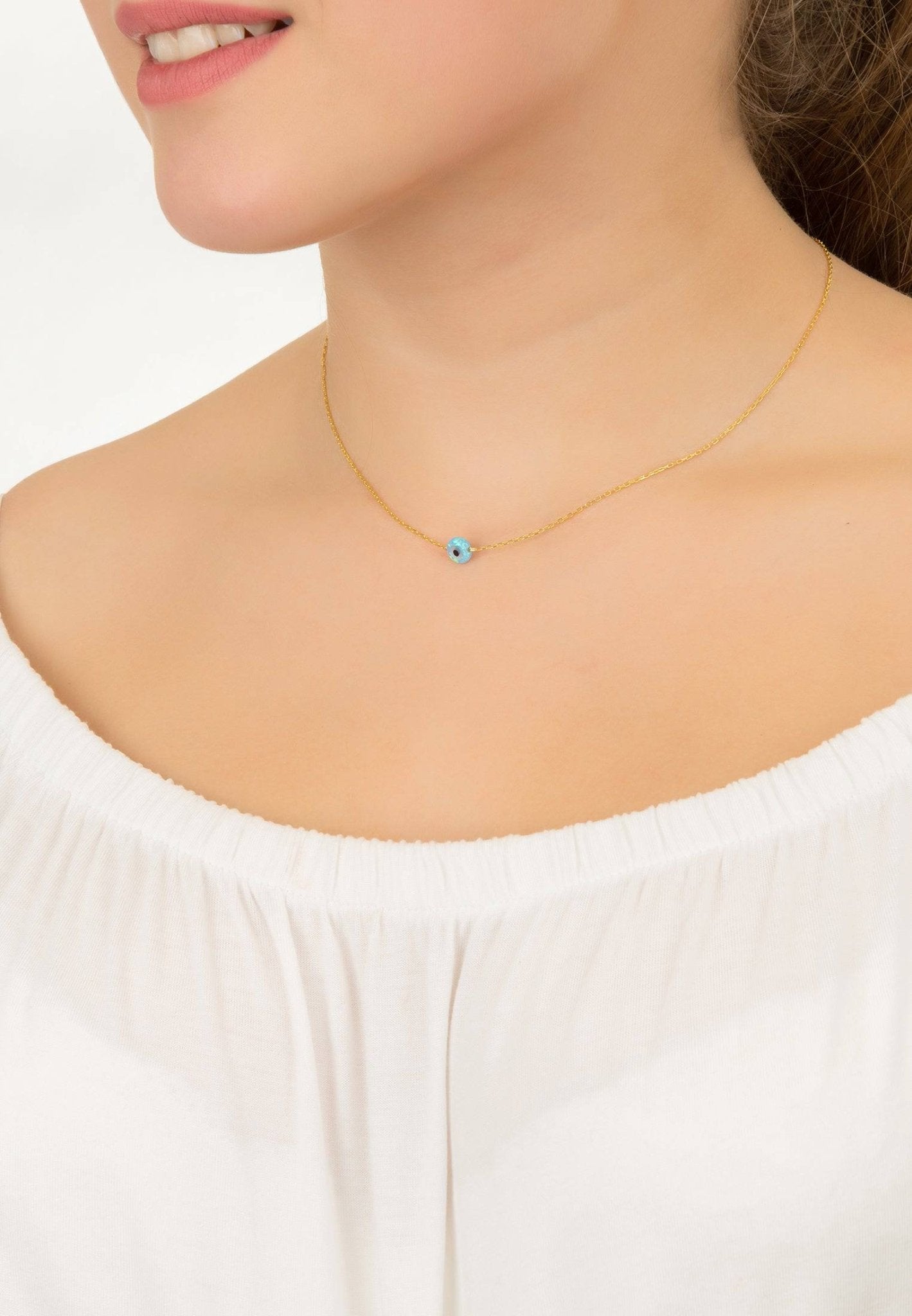 Evil Eye Mini Opalite Pendant Necklace in gold, featuring a delicate opalite evil eye charm on a sterling silver chain.