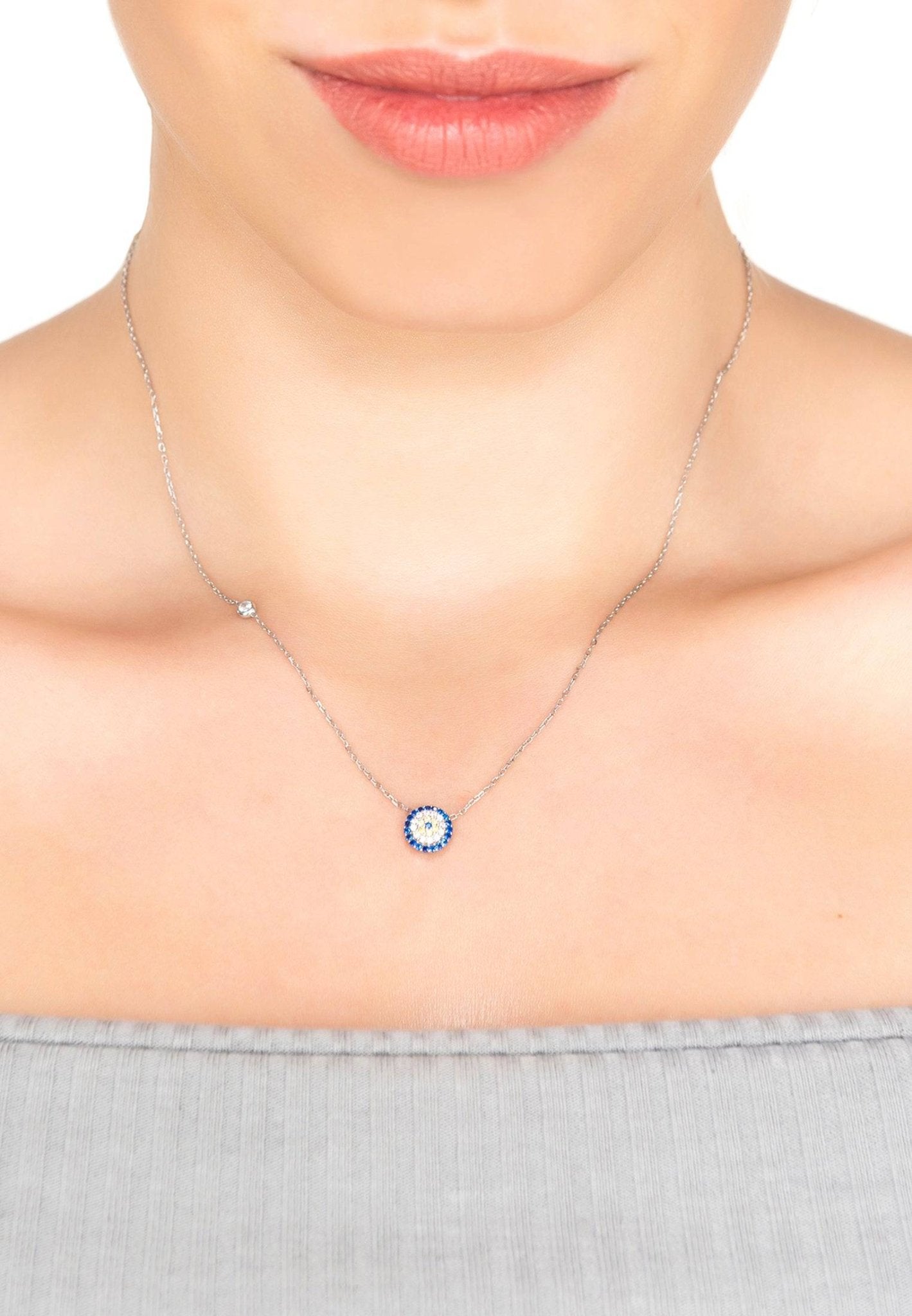 Elegant silver Evil Eye Necklace featuring blue and white zircon embellishments, perfect for everyday wear.