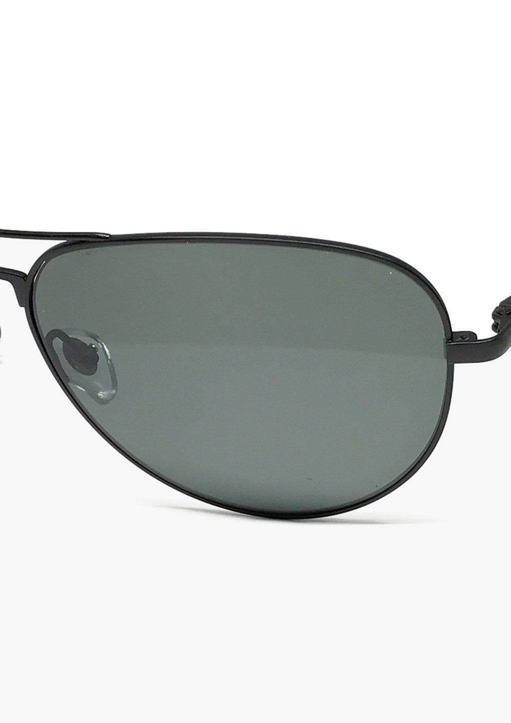 Close-up of aviator sunglasses lens.