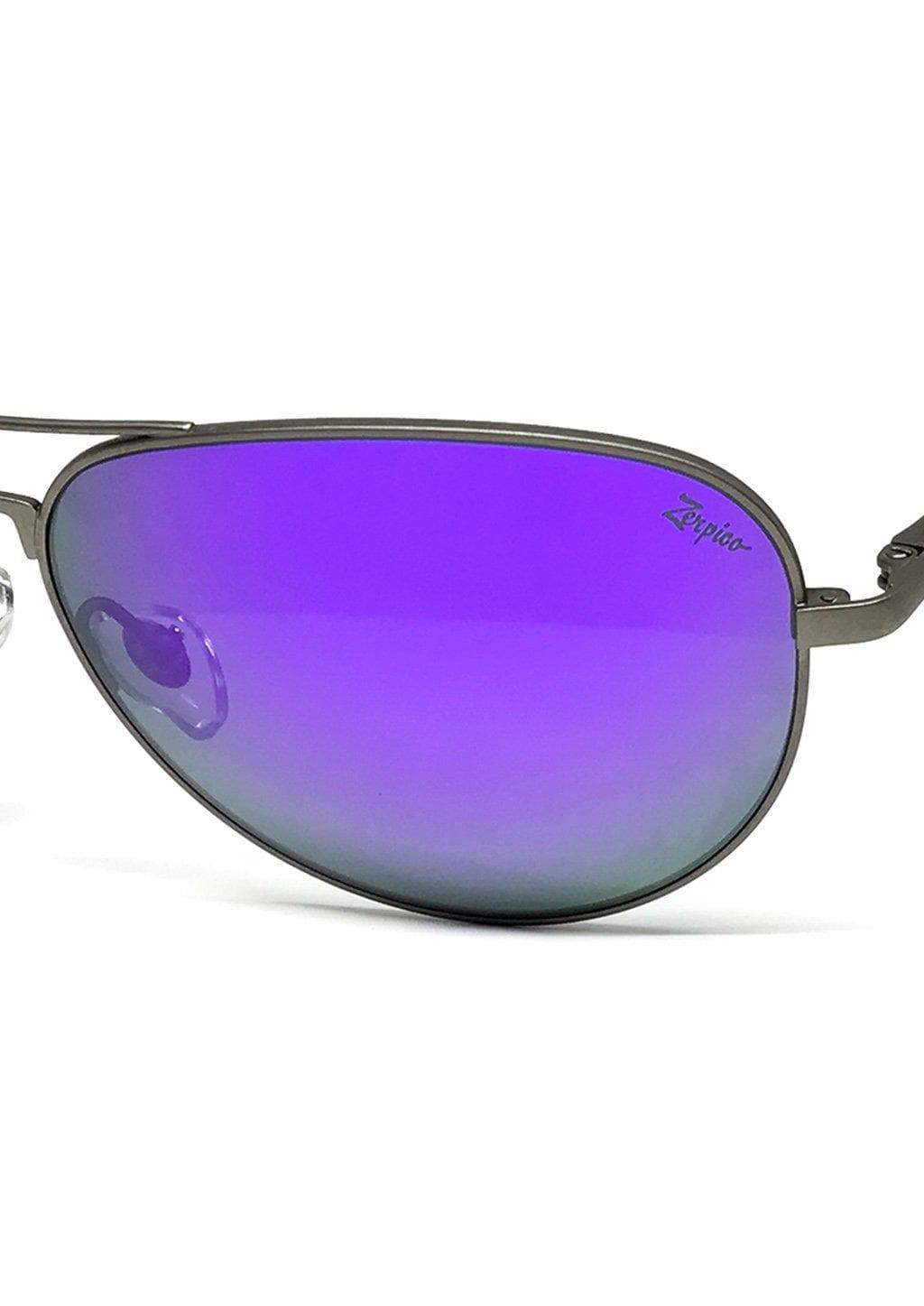 Purple tinted aviator sunglasses lens.