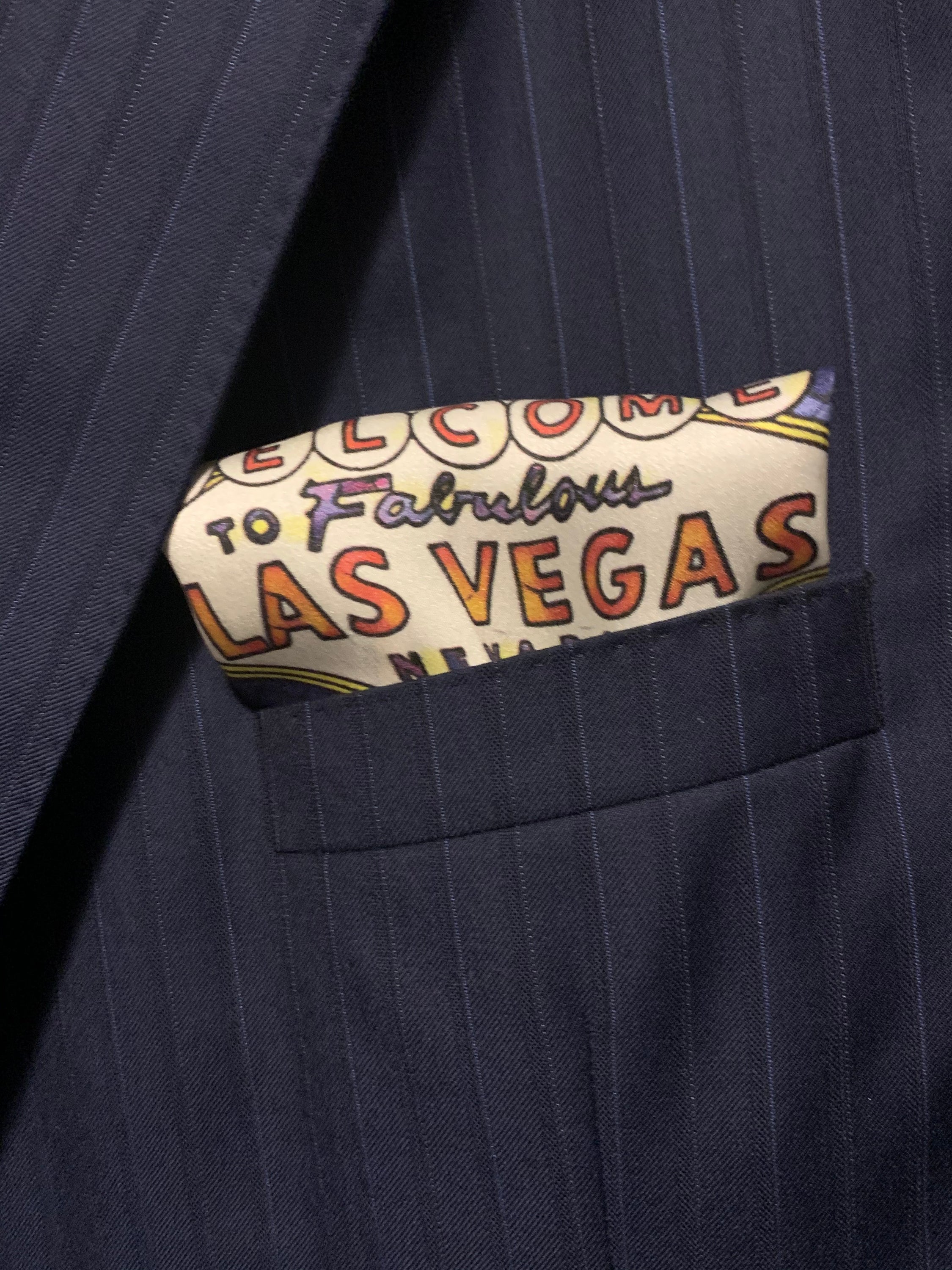 Fabulous Las Vegas Bold Pocket Square featuring a hand-sketched design of the New York New York hotel in vibrant colors.