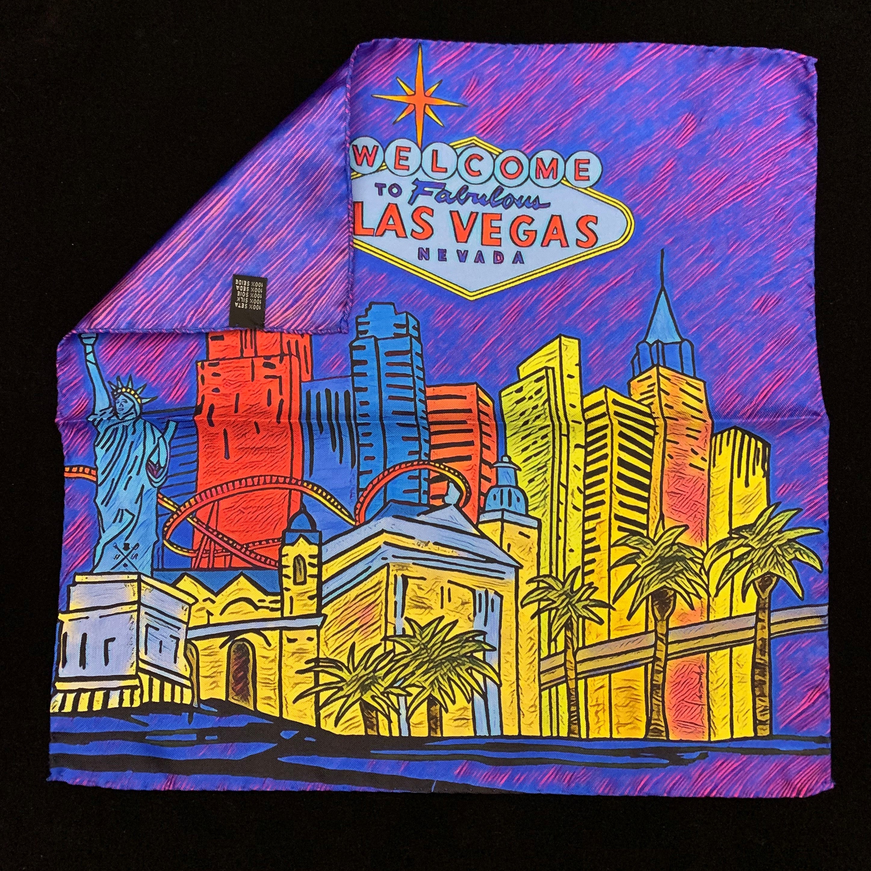 Fabulous Las Vegas Sunset Pocket Square featuring a hand-sketched design of the New York New York hotel in vibrant sunset colors.