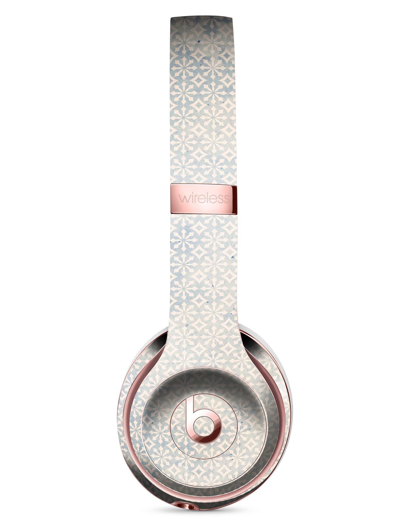 Faded blue and white snowflake pattern skin kit for Beats by Dre Solo 3 Wireless Headphones, showcasing a stylish design.