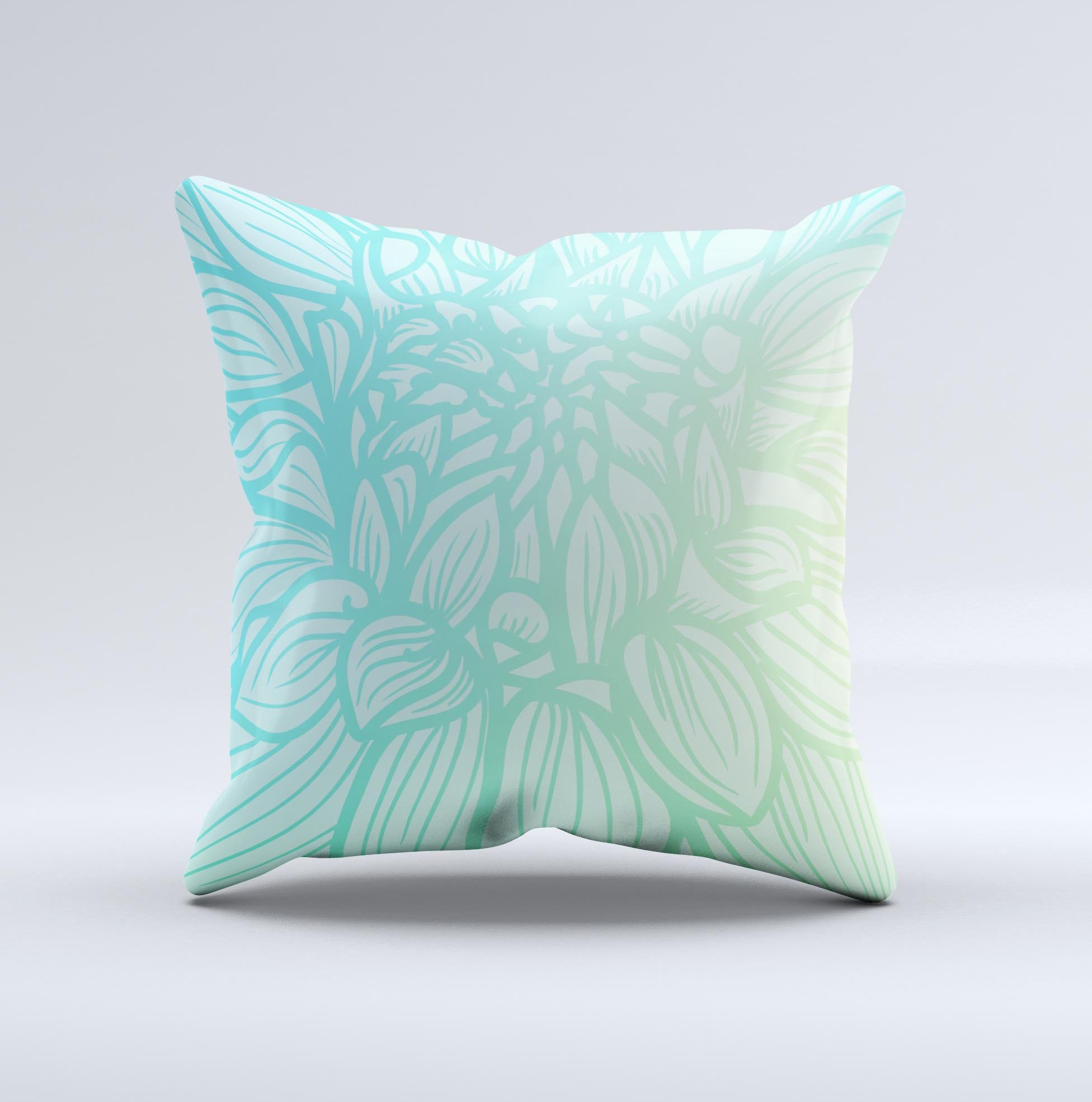 Faded blue green decorative throw pillow with subtle floral design, showcasing unique handmade craftsmanship and high-quality fabric.