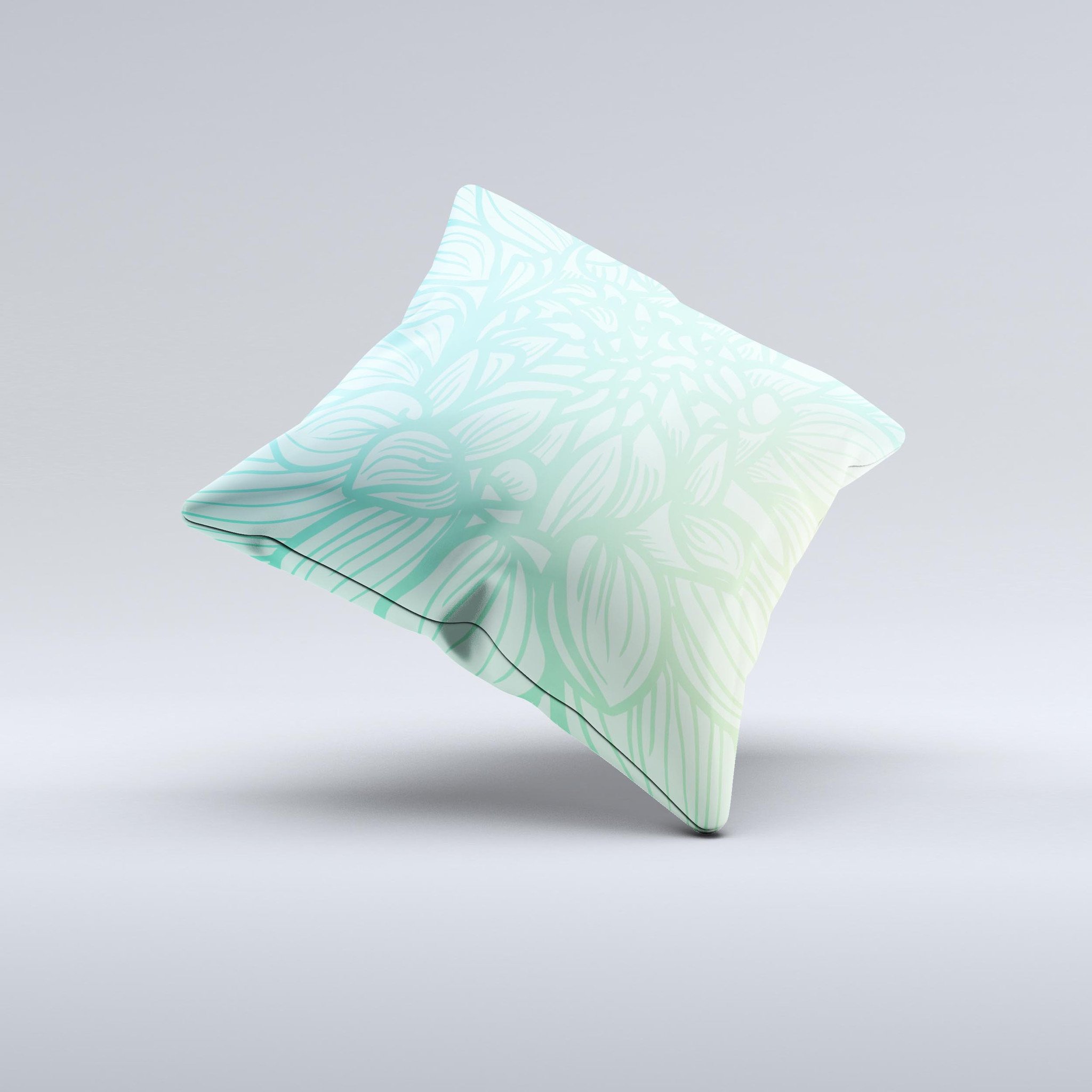 Faded blue green decorative throw pillow with subtle floral design, showcasing unique handmade craftsmanship and high-quality fabric.