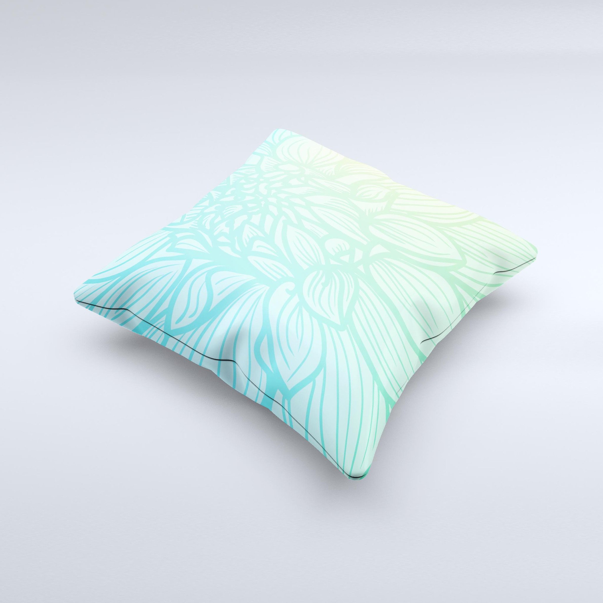 Faded blue green decorative throw pillow with subtle floral design, showcasing unique handmade craftsmanship and high-quality fabric.