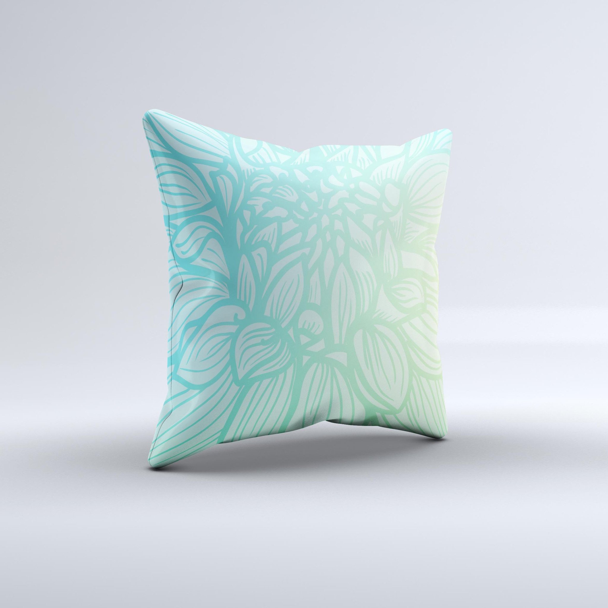 Faded blue green decorative throw pillow with subtle floral design, showcasing unique handmade craftsmanship and high-quality fabric.