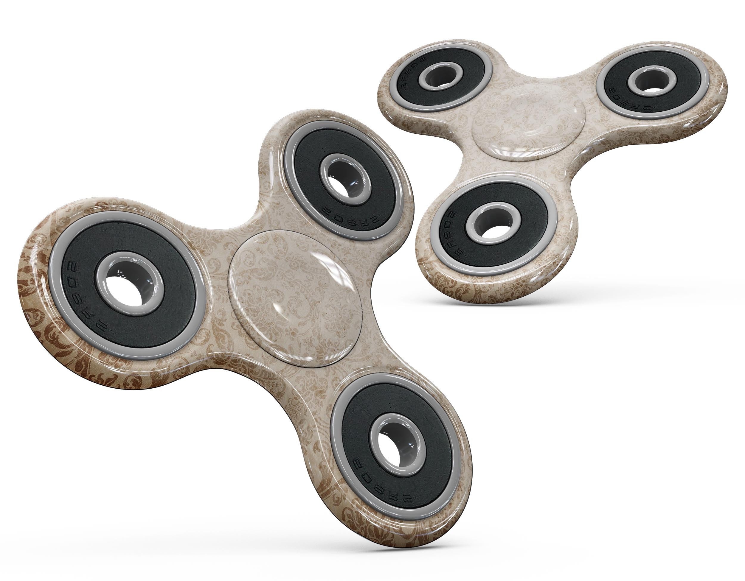 Faded Brown and Yellow Rococo Pattern skin for fidget spinner, showcasing intricate design and premium vinyl material.