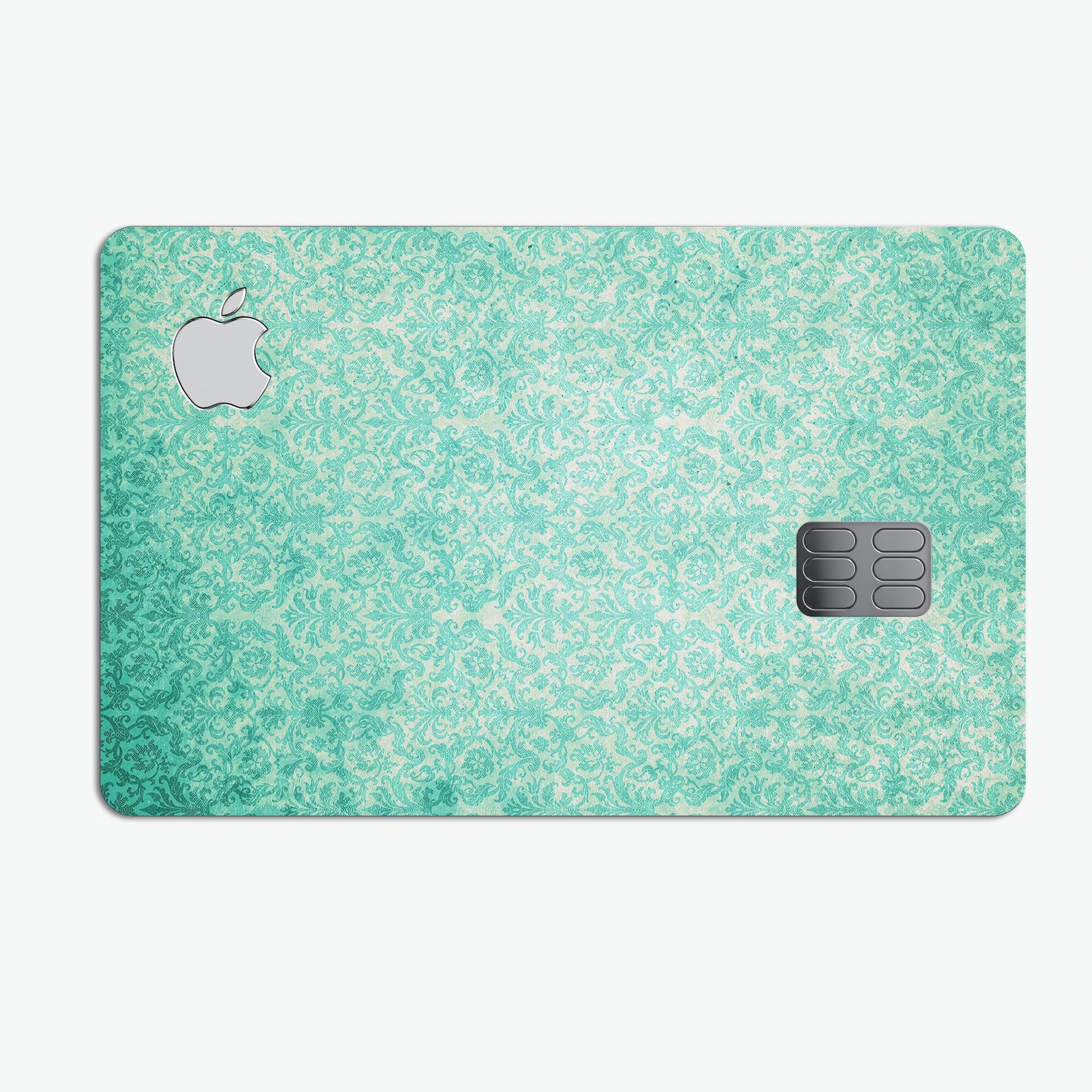 Faded teal and green patterned premium protective decal for Apple Card, showcasing its stylish design and protective features.