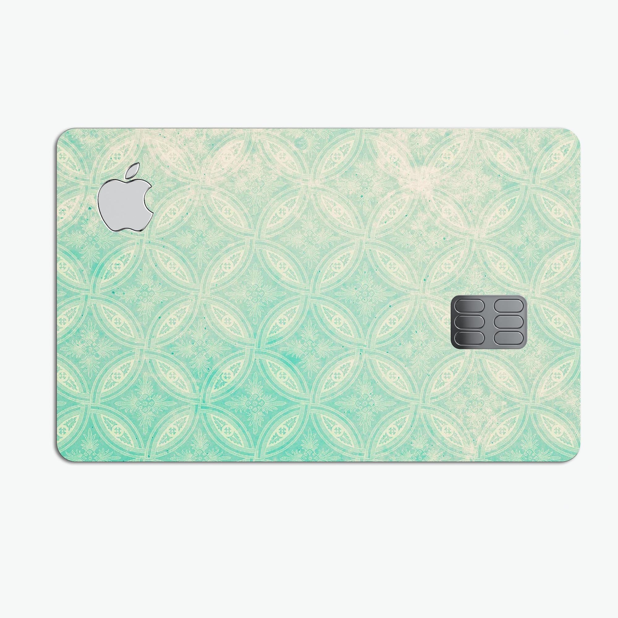 Faded teal overlapping circles decal skin for Apple Card, showcasing its premium design and protective features.