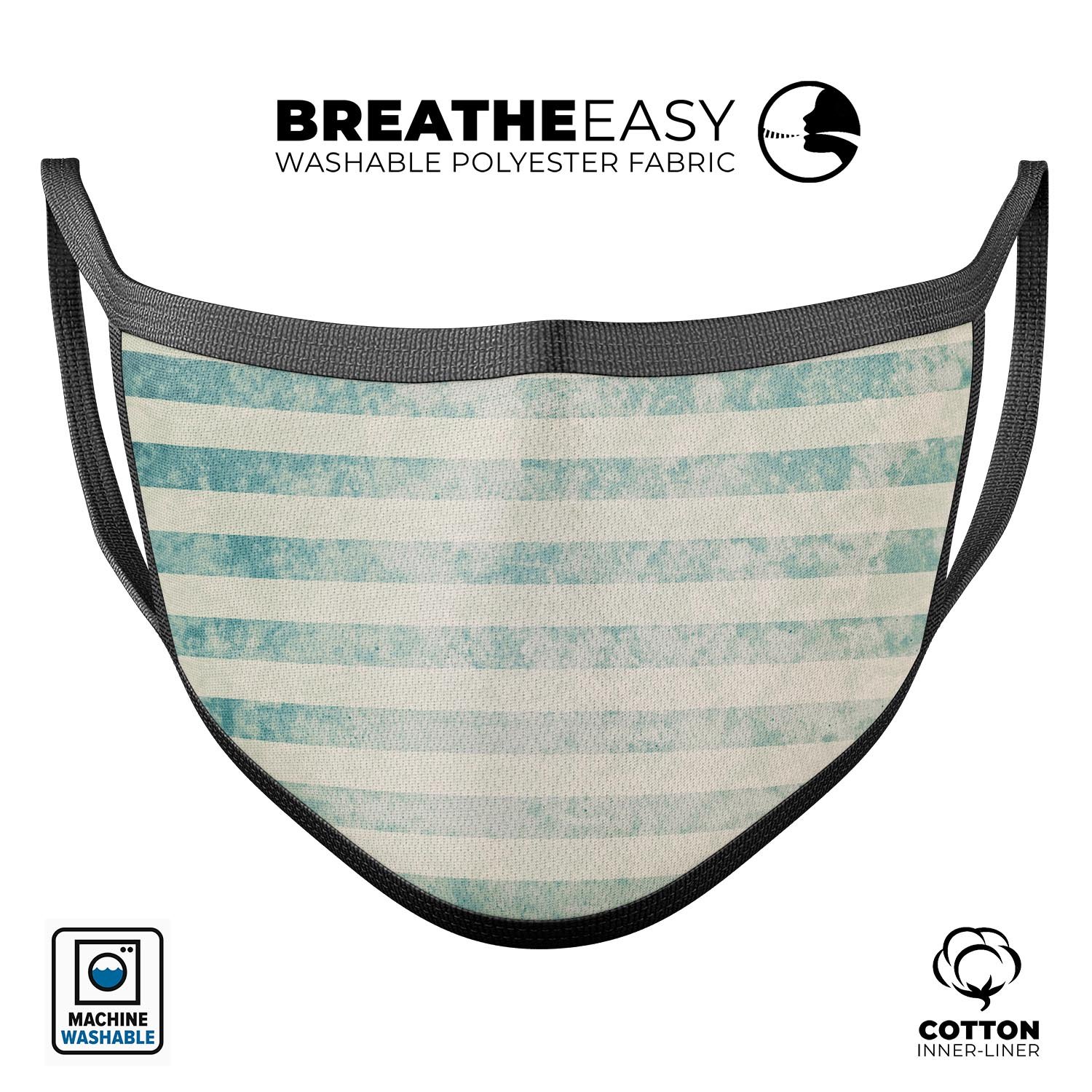 Faded white and blue striped 3D face mask made in the USA, featuring adjustable ear loops and a soft cotton interior.