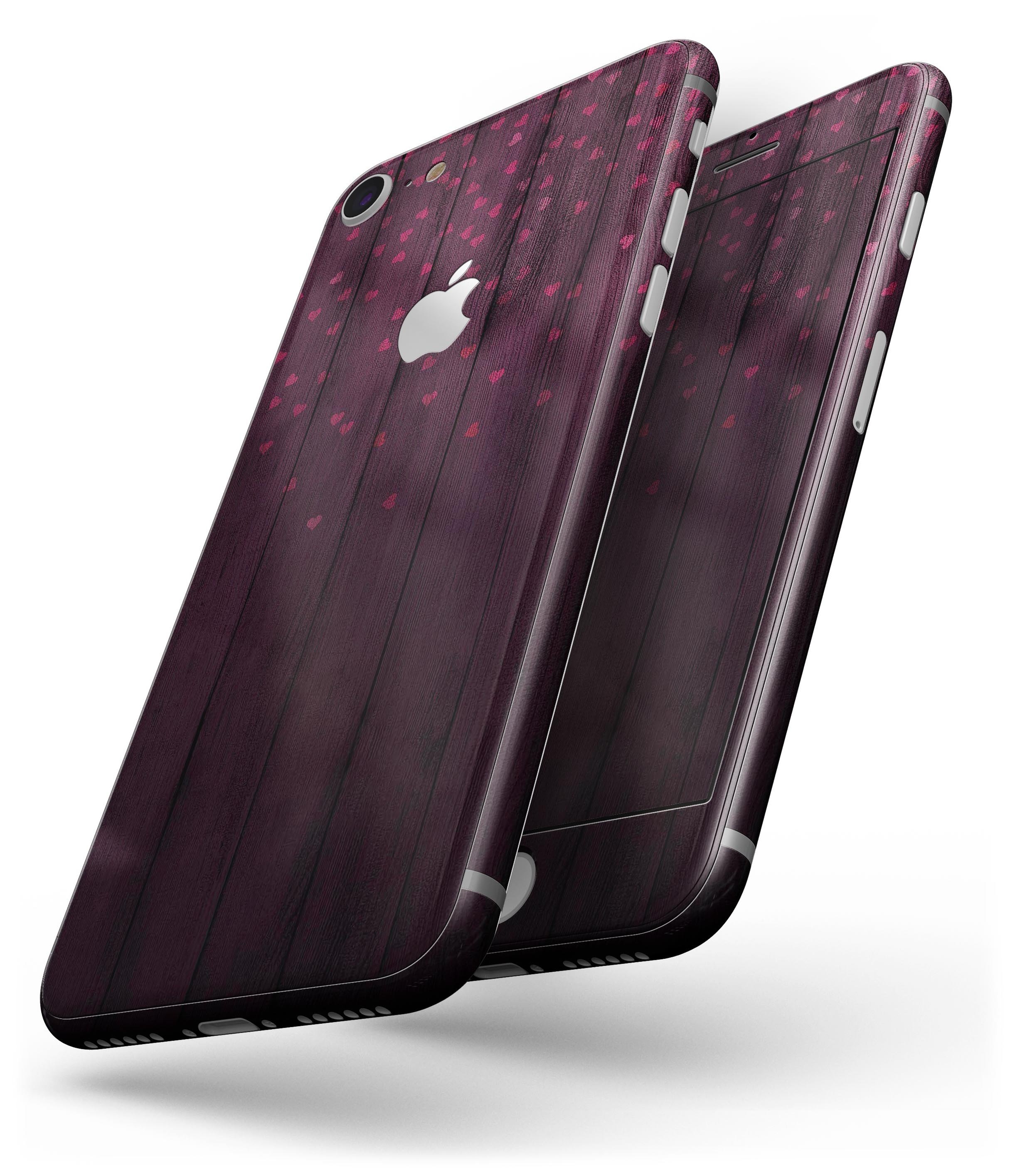 Falling Micro Hearts Skin-kit for iPhone 8 and 8 Plus, featuring a stylish design on burgundy wood planks.