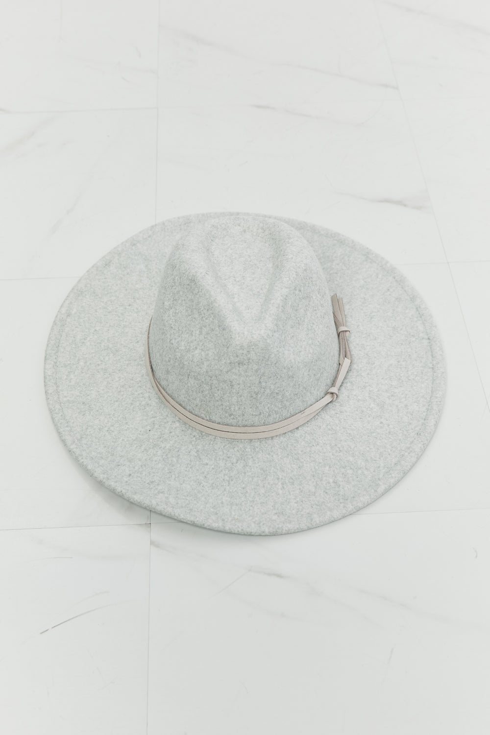 Fame Festival Babe Fedora Hat in light grey with faux leather knot detailing, showcasing its stylish design and adjustable straps.