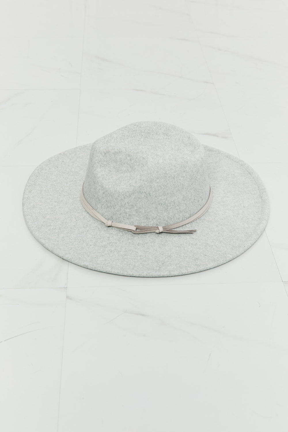 Fame Festival Babe Fedora Hat in light grey with faux leather knot detailing, showcasing its stylish design and adjustable straps.