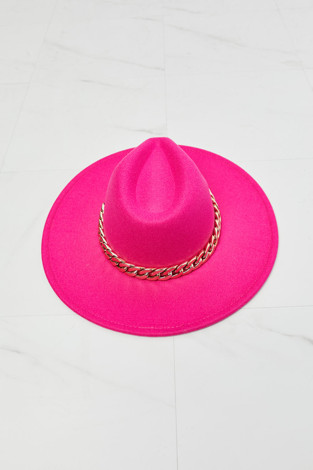 Fame Keep Your Promise Fedora Hat in vibrant pink with chain detailing and adjustable straps, perfect for stylish outfits.