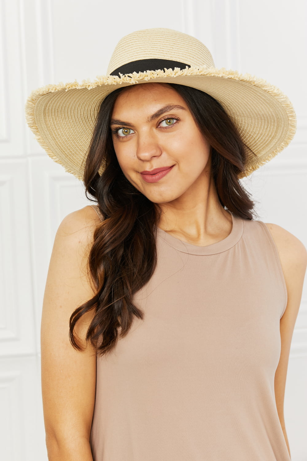 Fame Time For The Sun Straw Hat with fringe rim and black ribbon detail, perfect for sun protection and stylish summer outings.