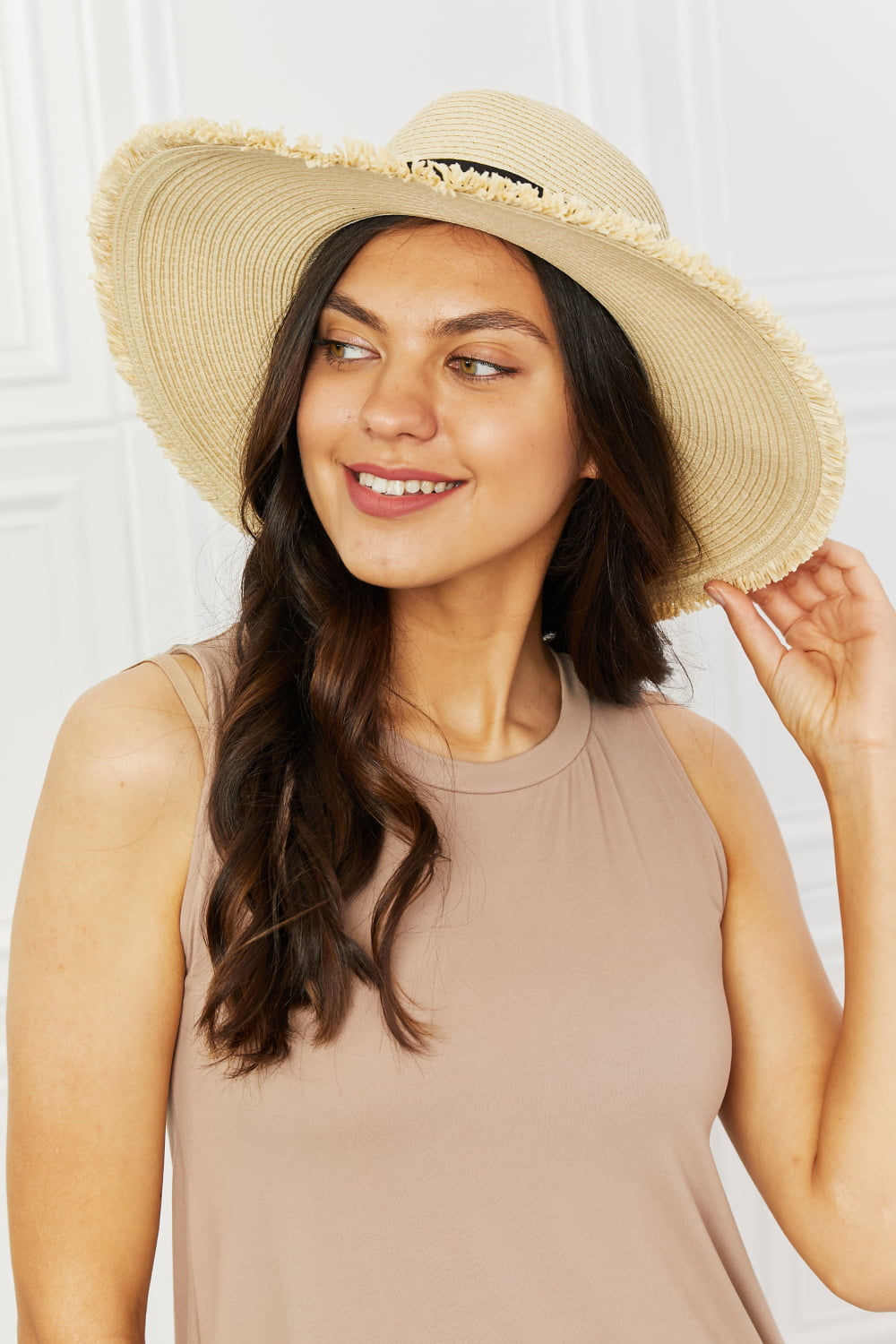 Fame Time For The Sun Straw Hat with fringe rim and black ribbon detail, perfect for sun protection and stylish summer outings.